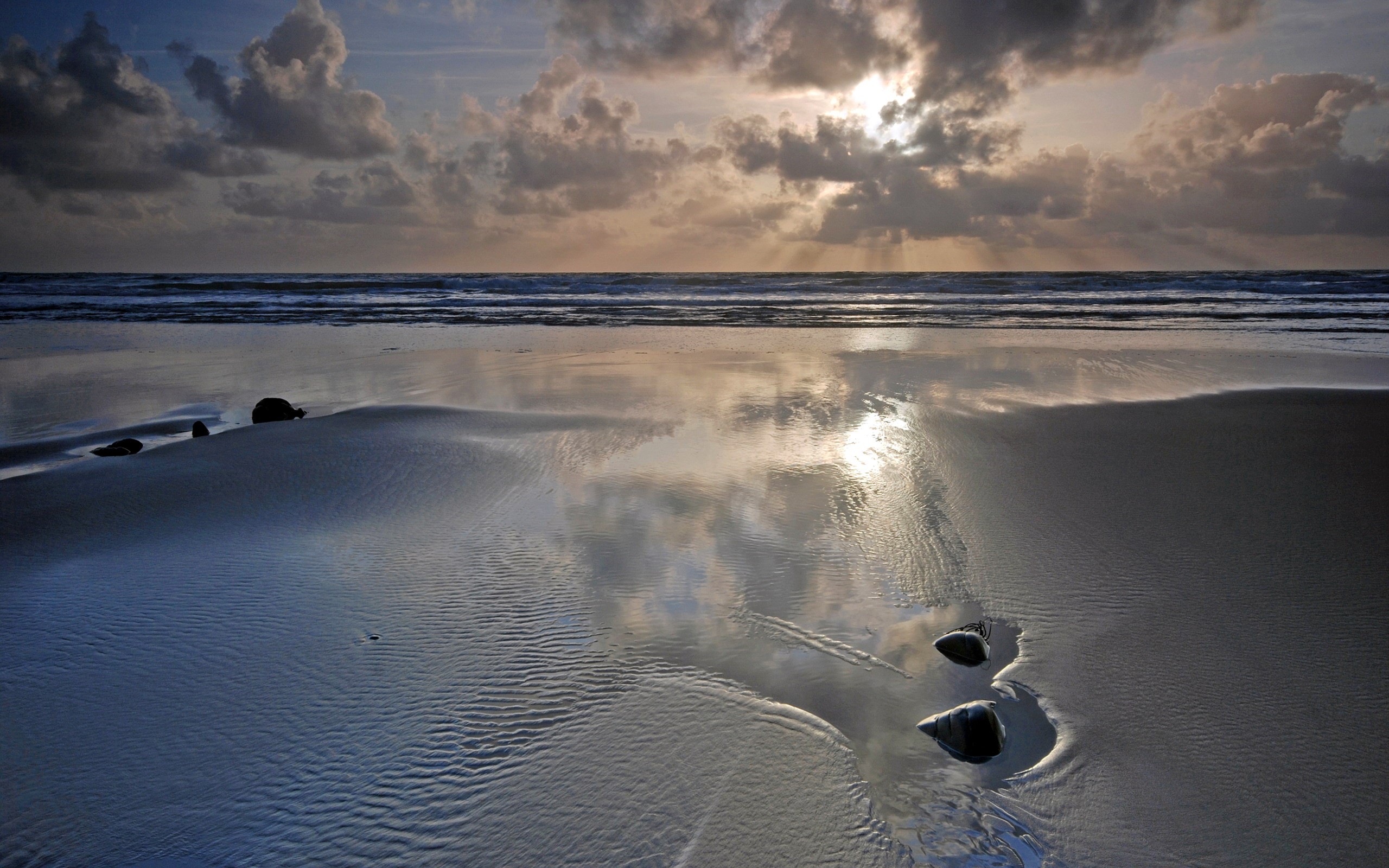 Beach with ocean waves and cloudy sky at sunset HD Wallpaper