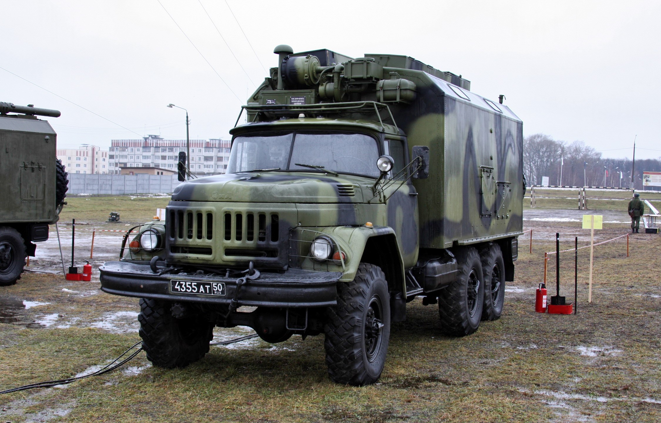 Military truck with camouflage HD Wallpaper