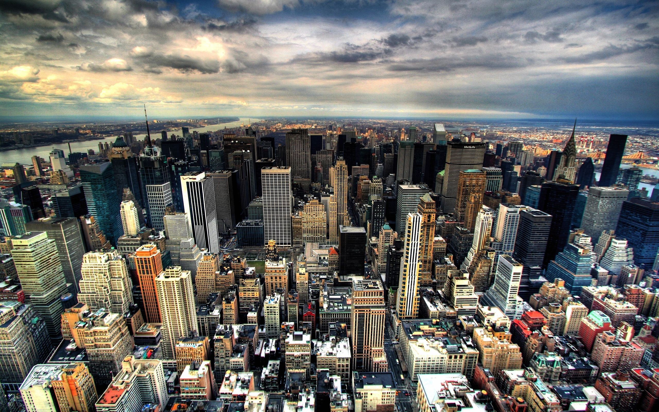 New York City Skyline with River and Clouds HD Wallpaper