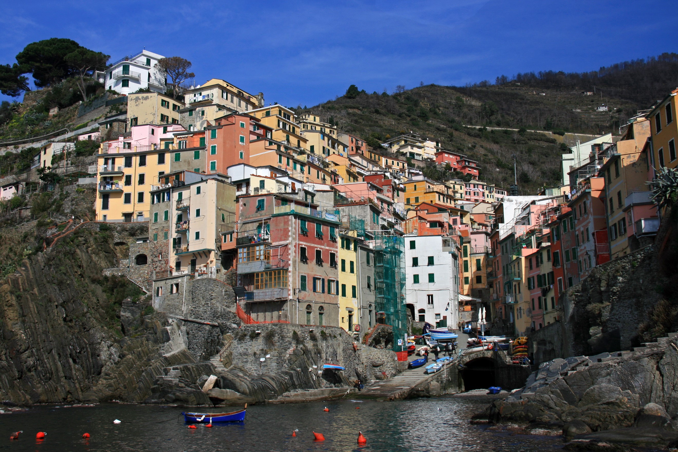 Colorful houses on a cliffside in Italy HD Wallpaper