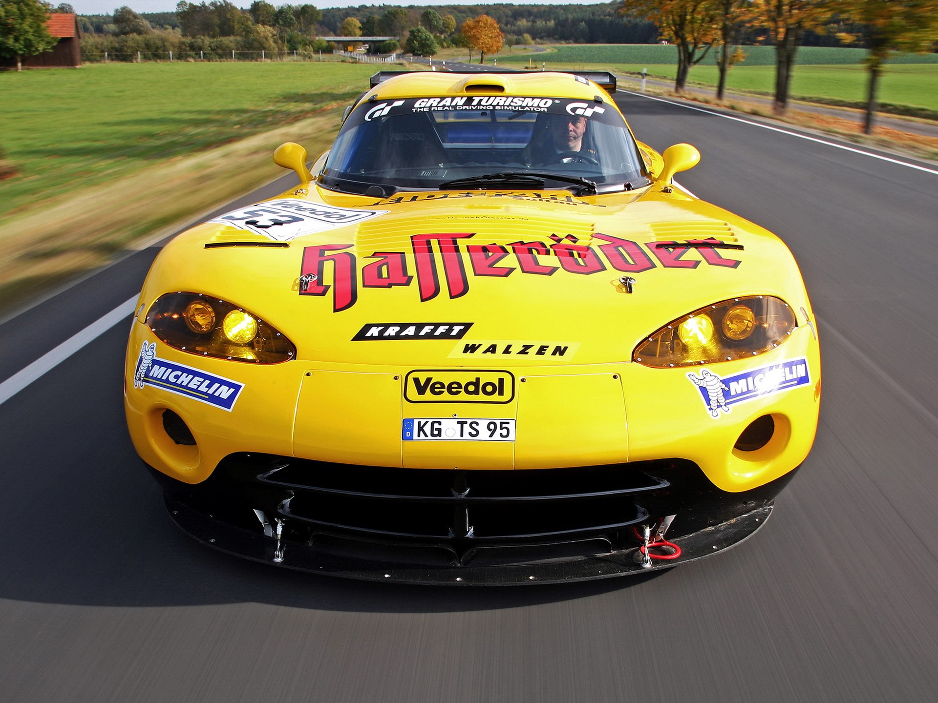 Yellow Dodge Viper race car on a road HD Wallpaper