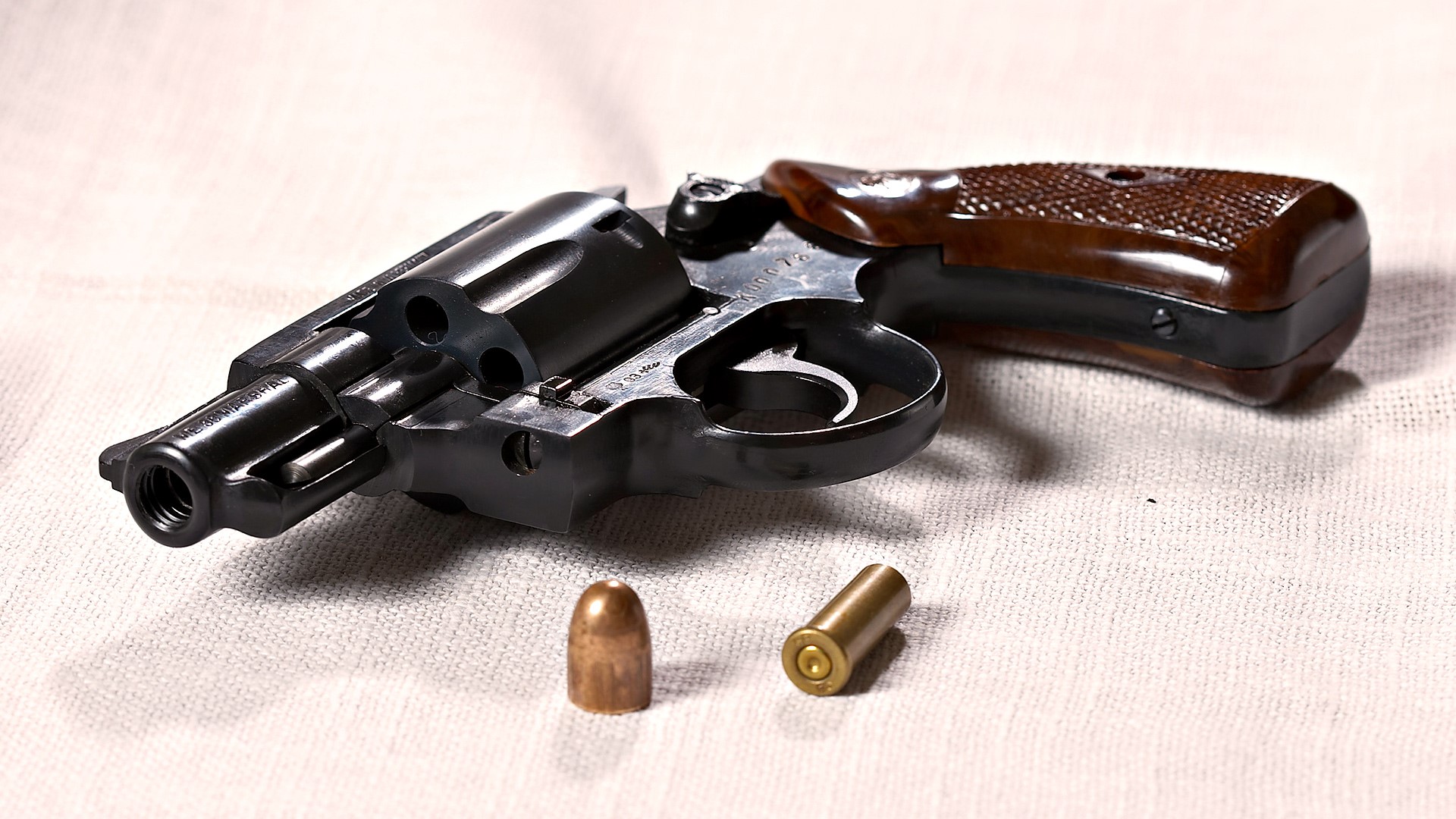 Revolver with two bullets HD Wallpaper