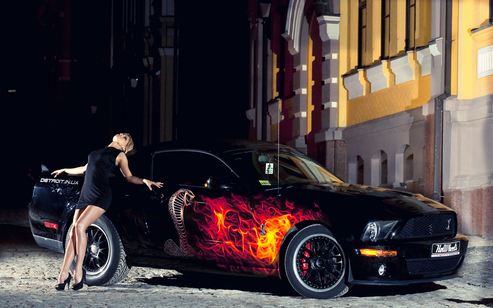 Woman posing with a custom Ford Mustang HD Wallpaper