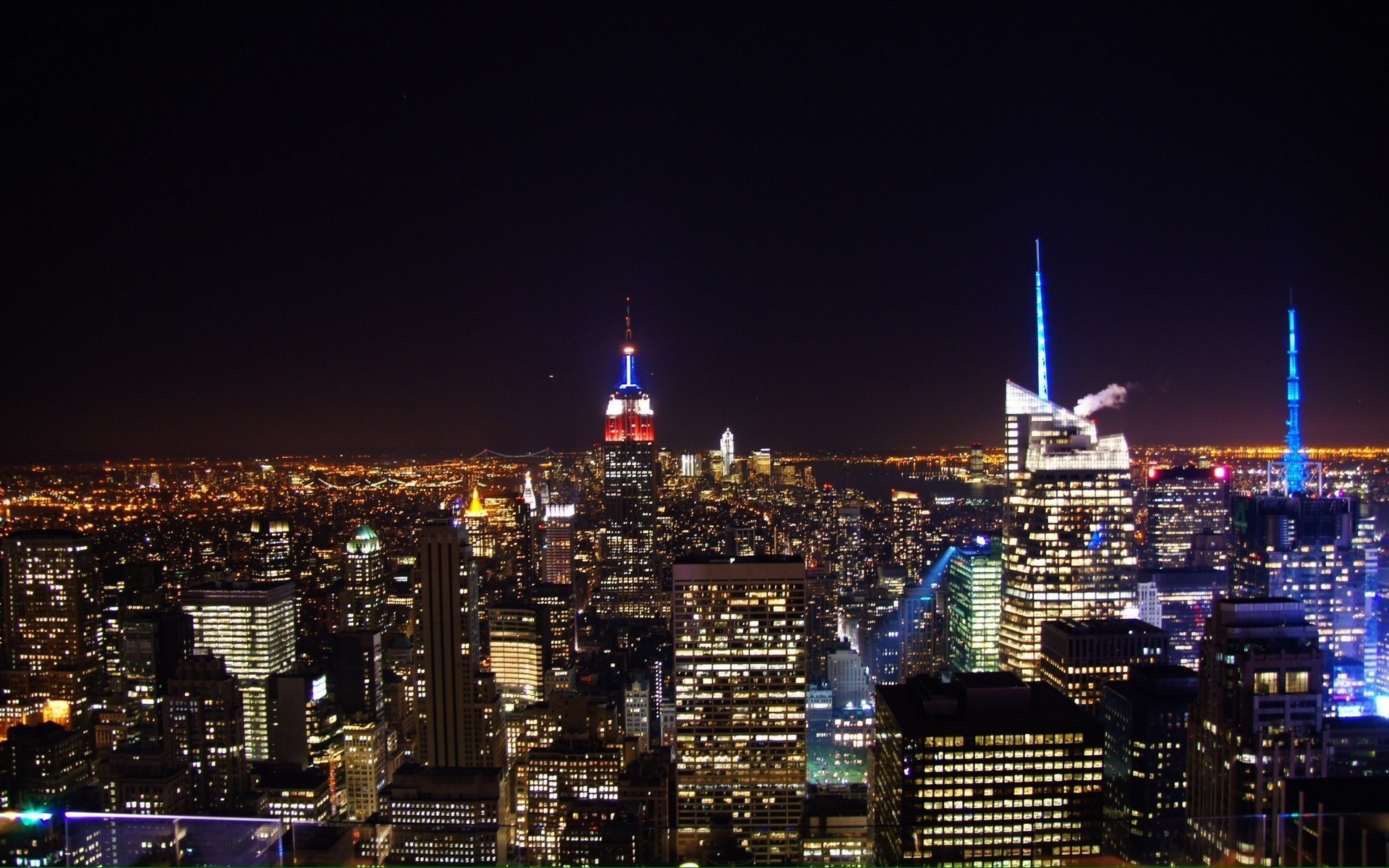 New York City skyline at night with Empire State Building HD Wallpaper