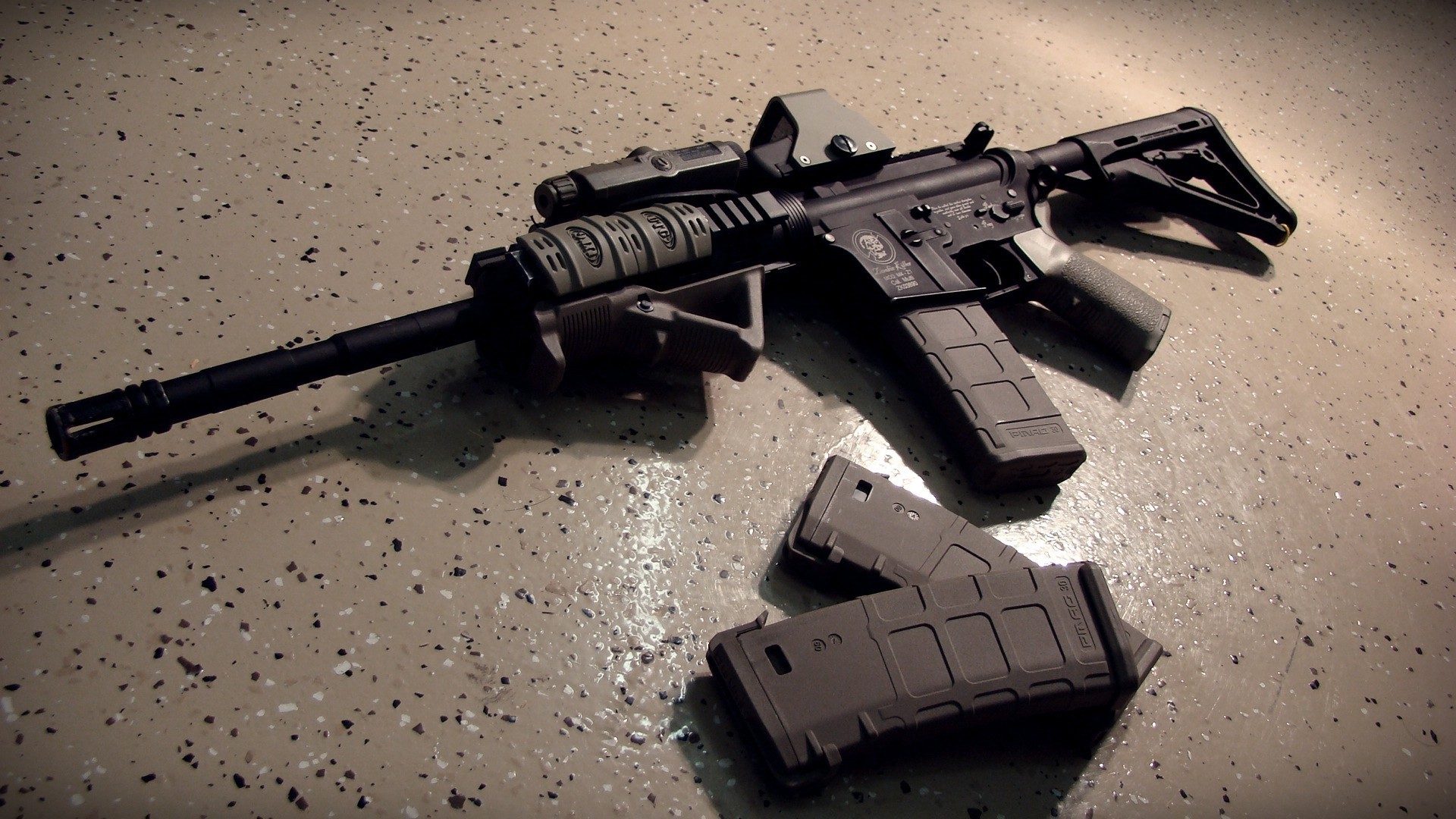 Assault rifle with magazines on floor HD Wallpaper