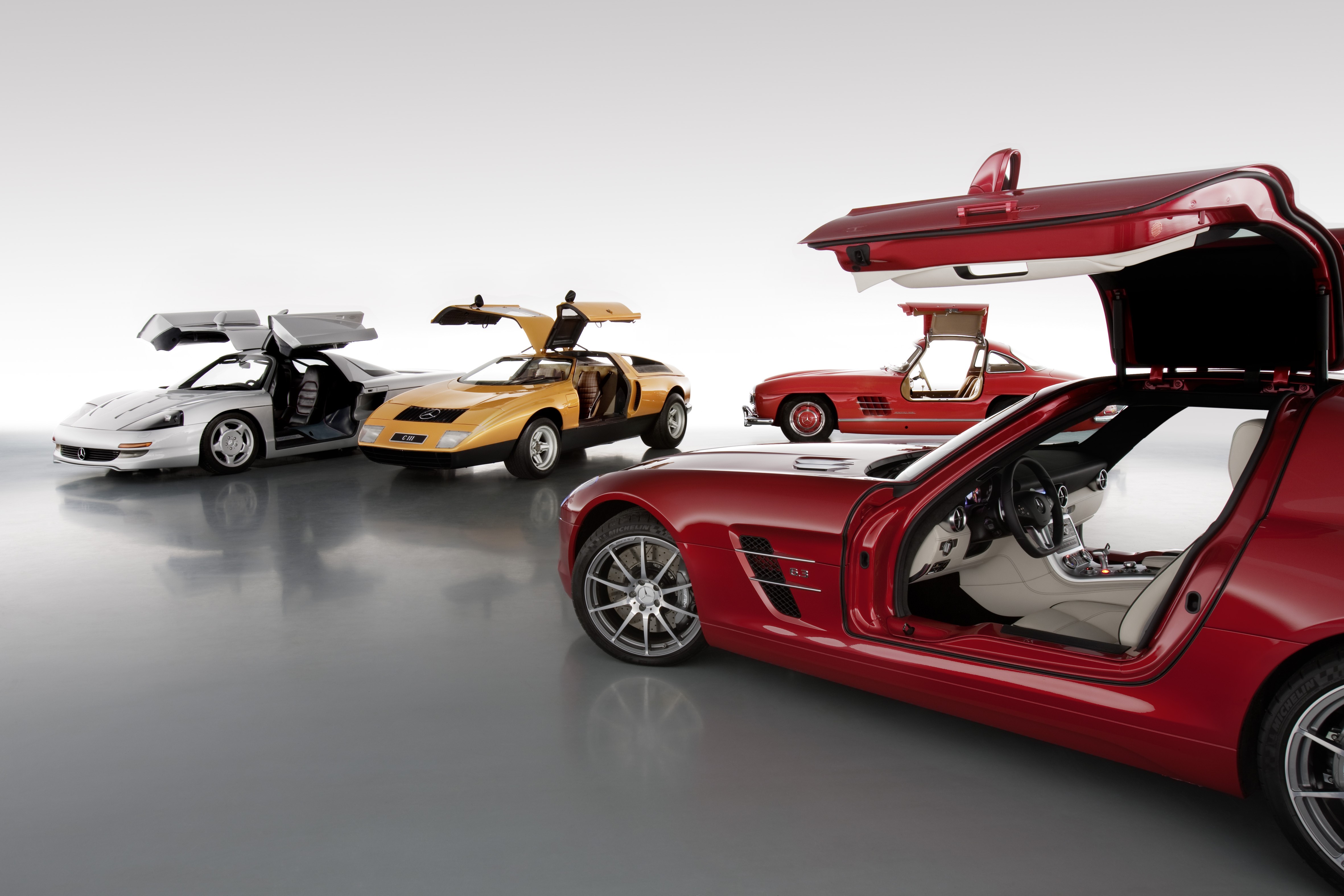 Four Mercedes-Benz Gullwing Cars HD Wallpaper