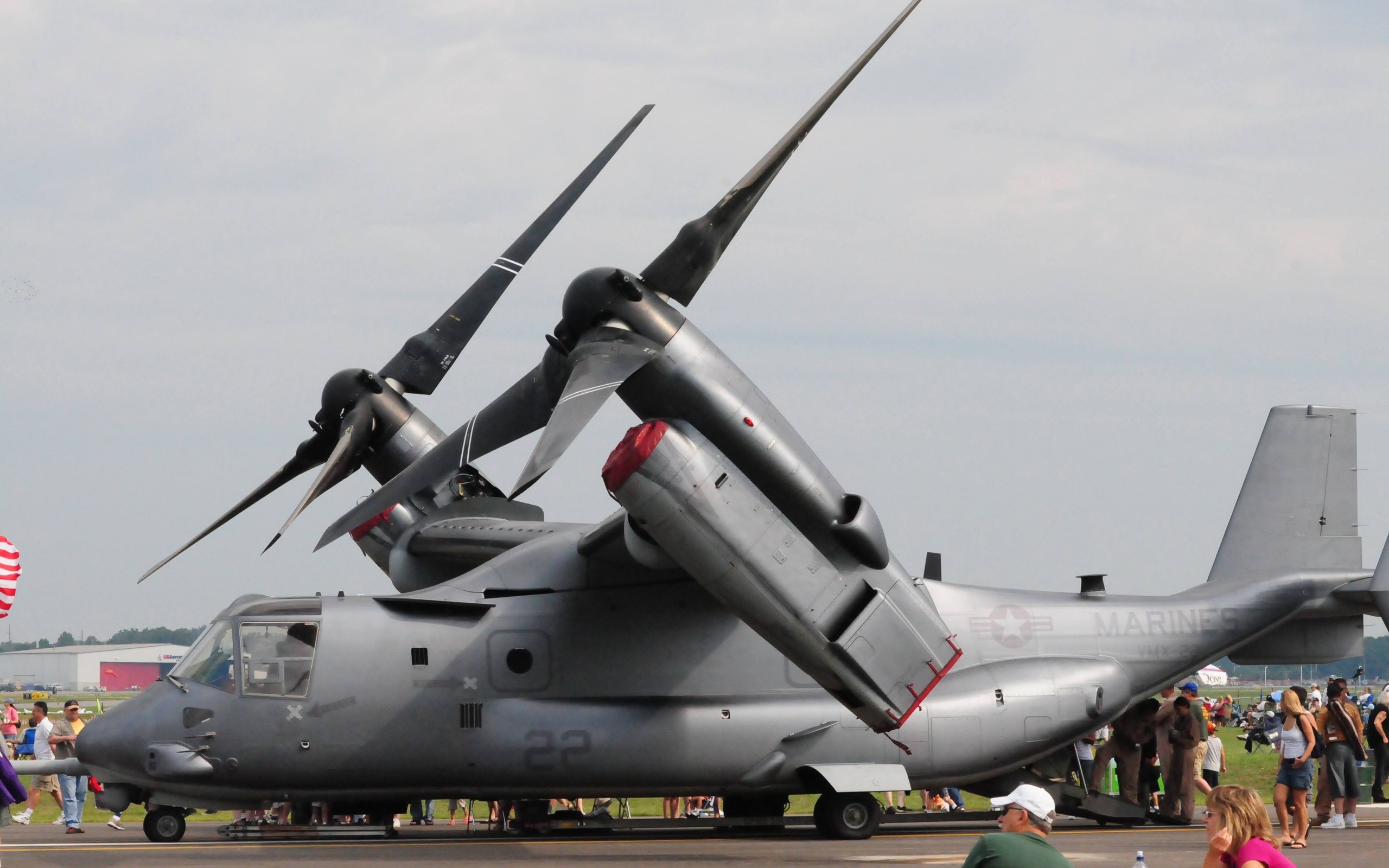 US Marine V-22 Osprey tiltrotor aircraft on tarmac HD Wallpaper