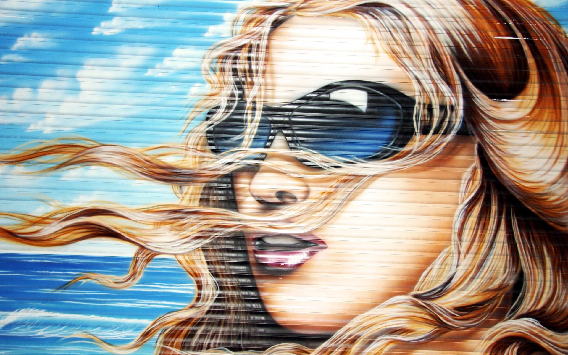 Graffiti of a woman with sunglasses and flowing hair HD Wallpaper