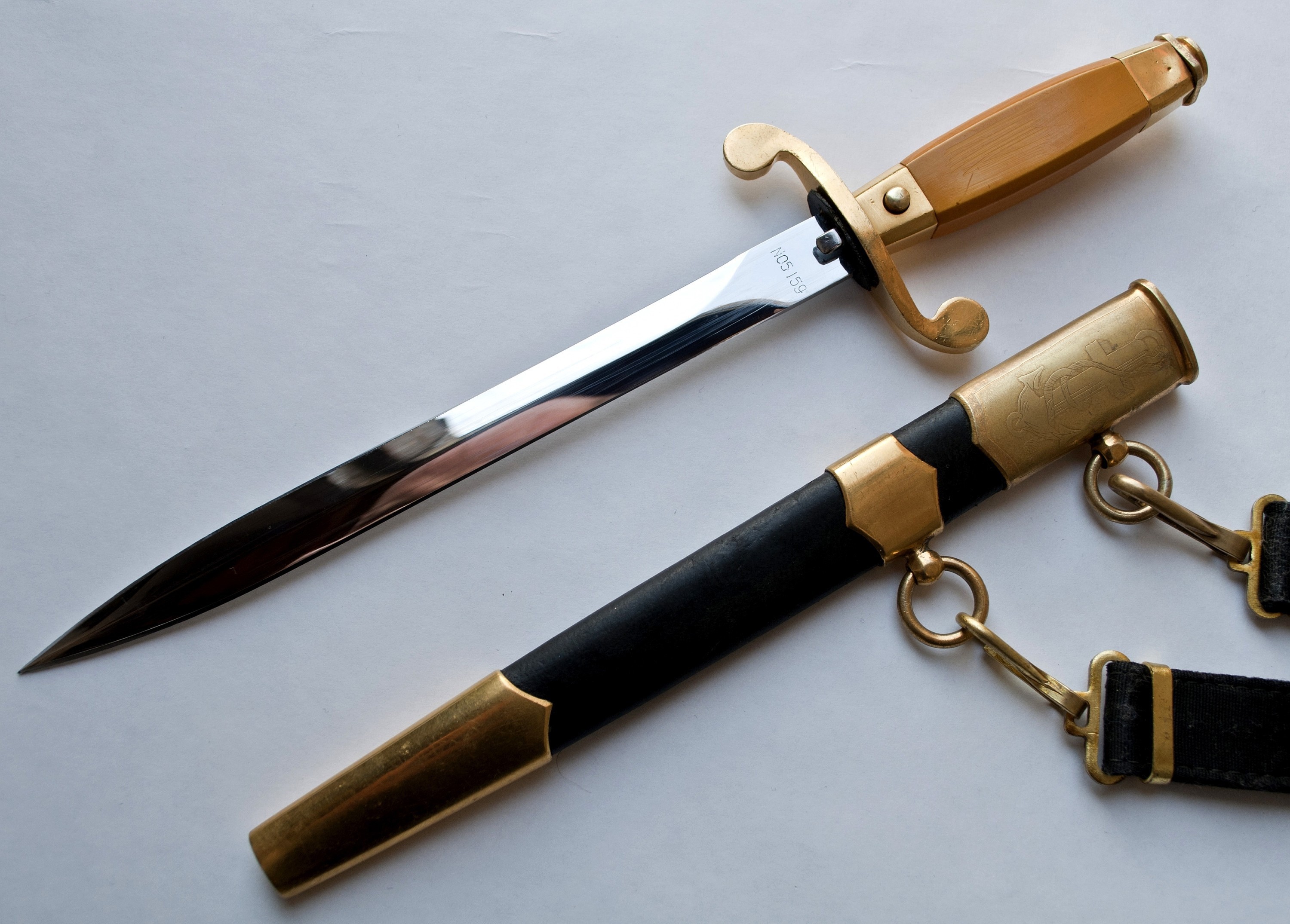 Naval dirk with scabbard and belt hangers HD Wallpaper