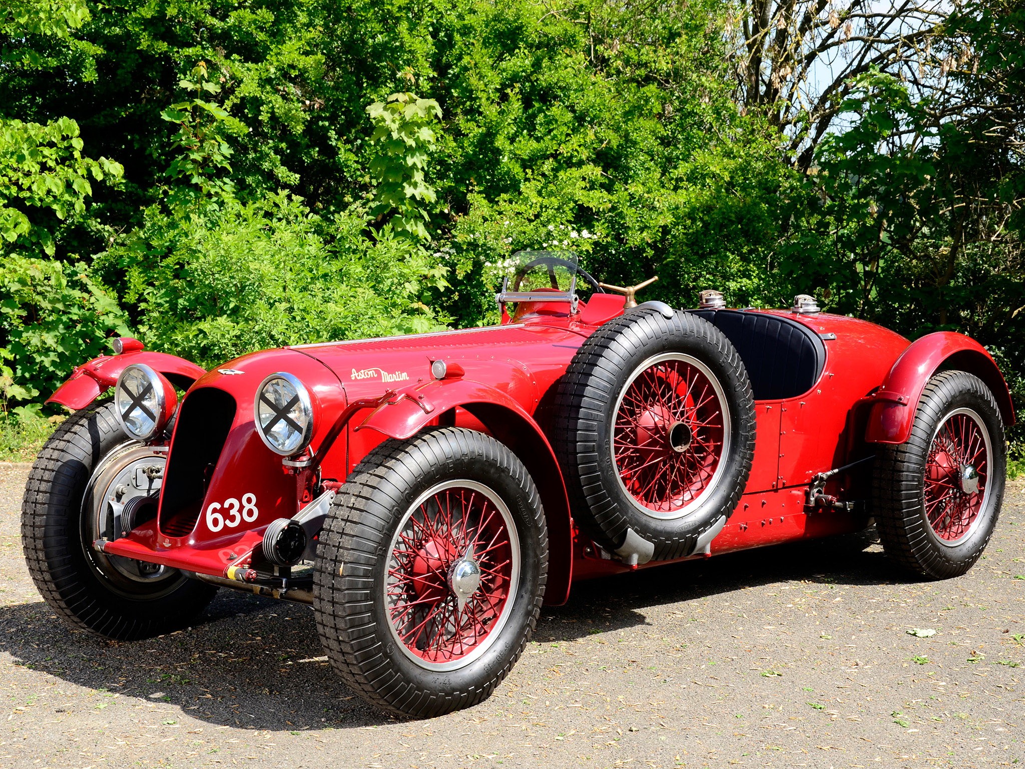 Red Aston Martin 1939 race car with spare tire HD Wallpaper