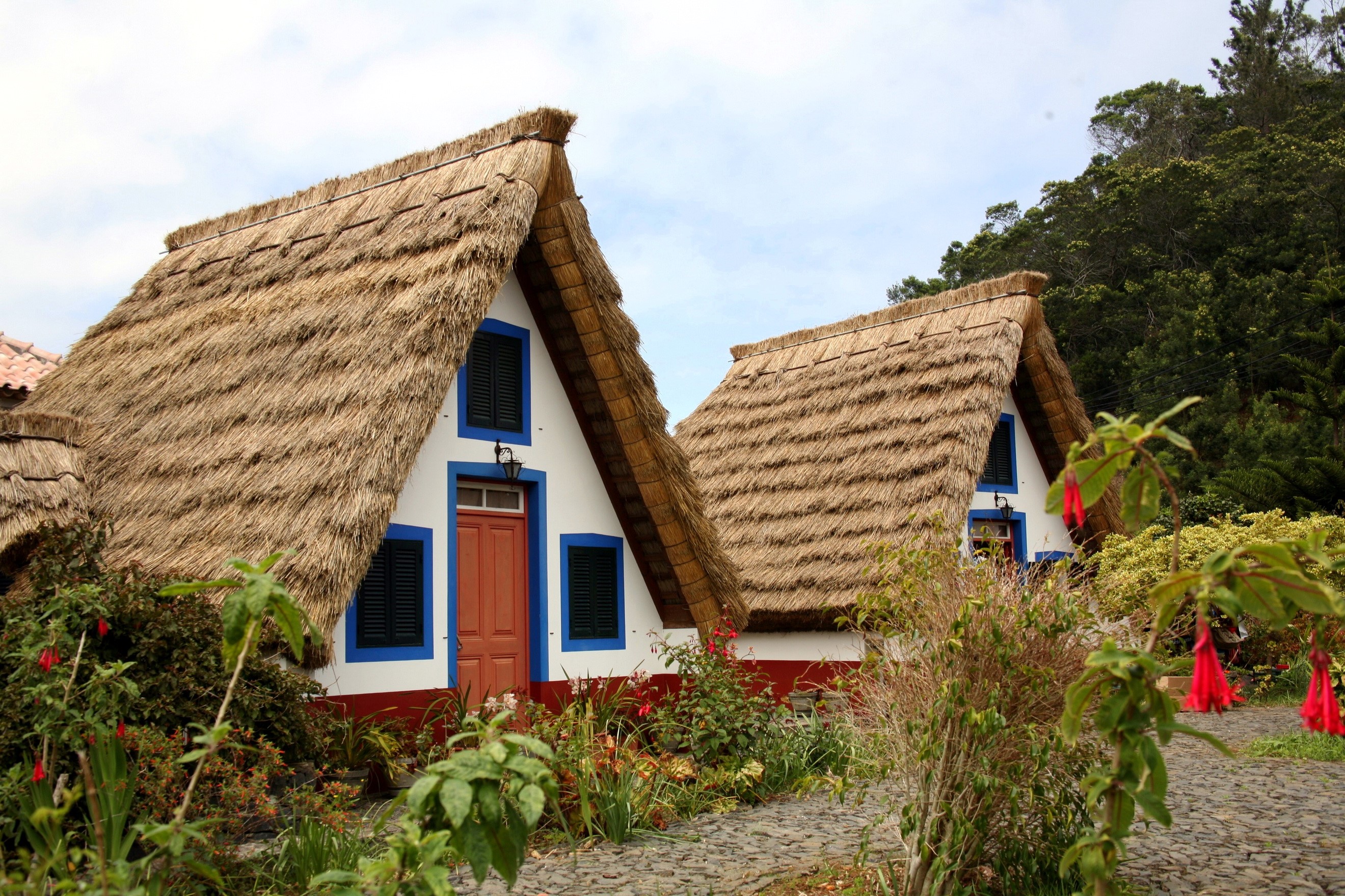 Traditional thatched houses in Santana, Madeira, Portugal HD Wallpaper