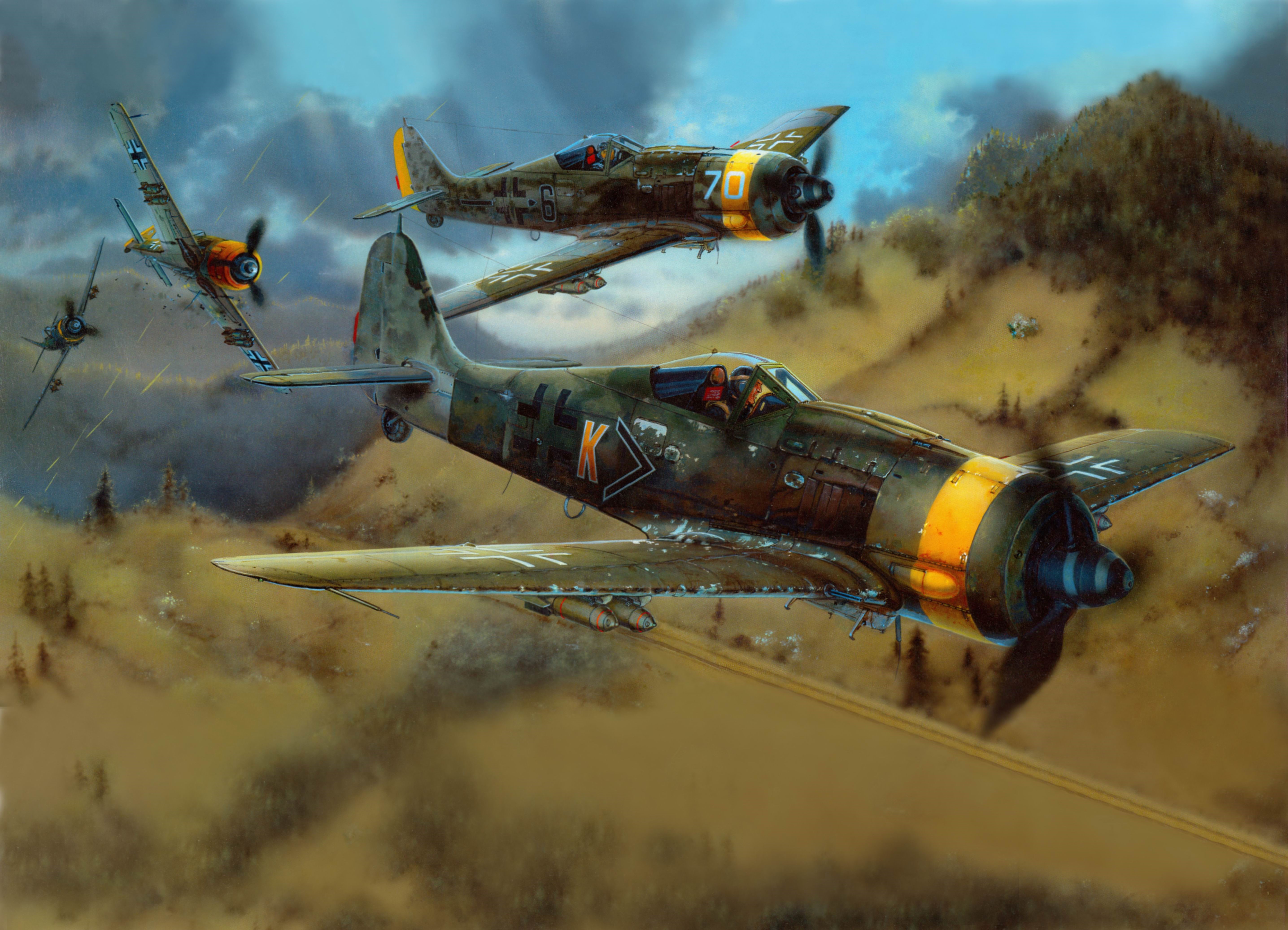 FW-190F Airplanes in Flight Over Hilly Terrain HD Wallpaper