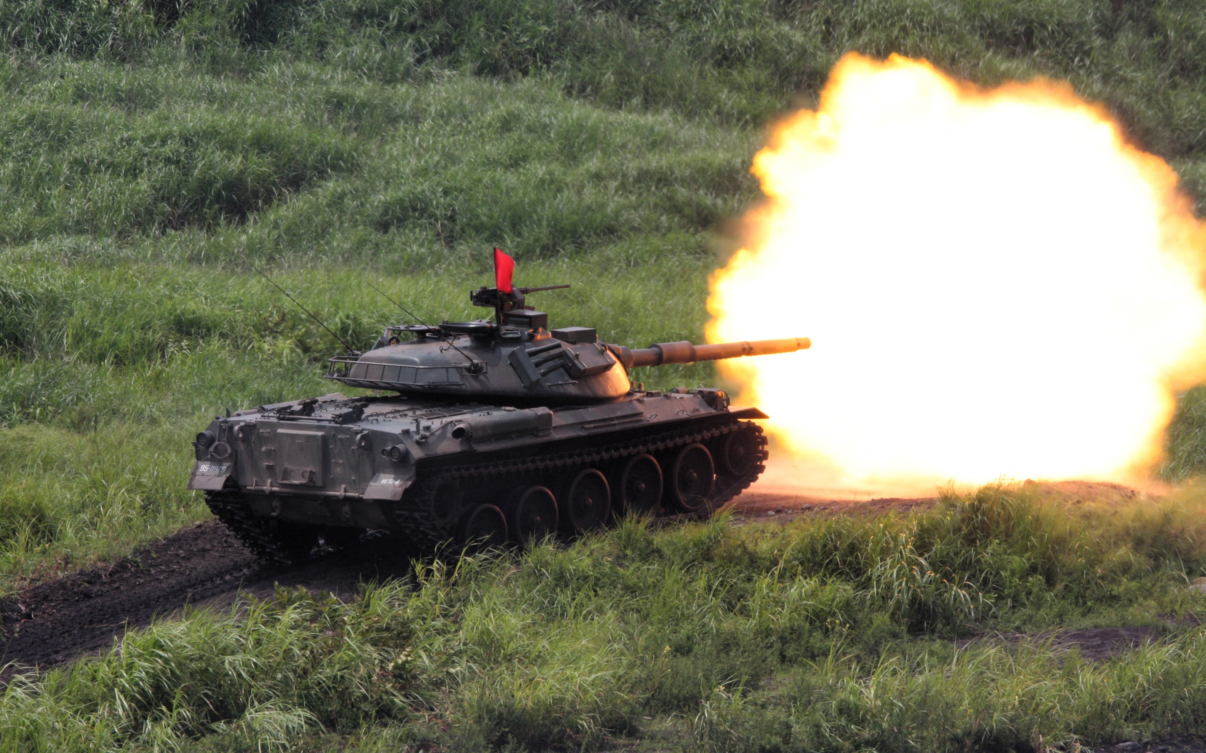 Tank firing a round with a large explosion HD Wallpaper