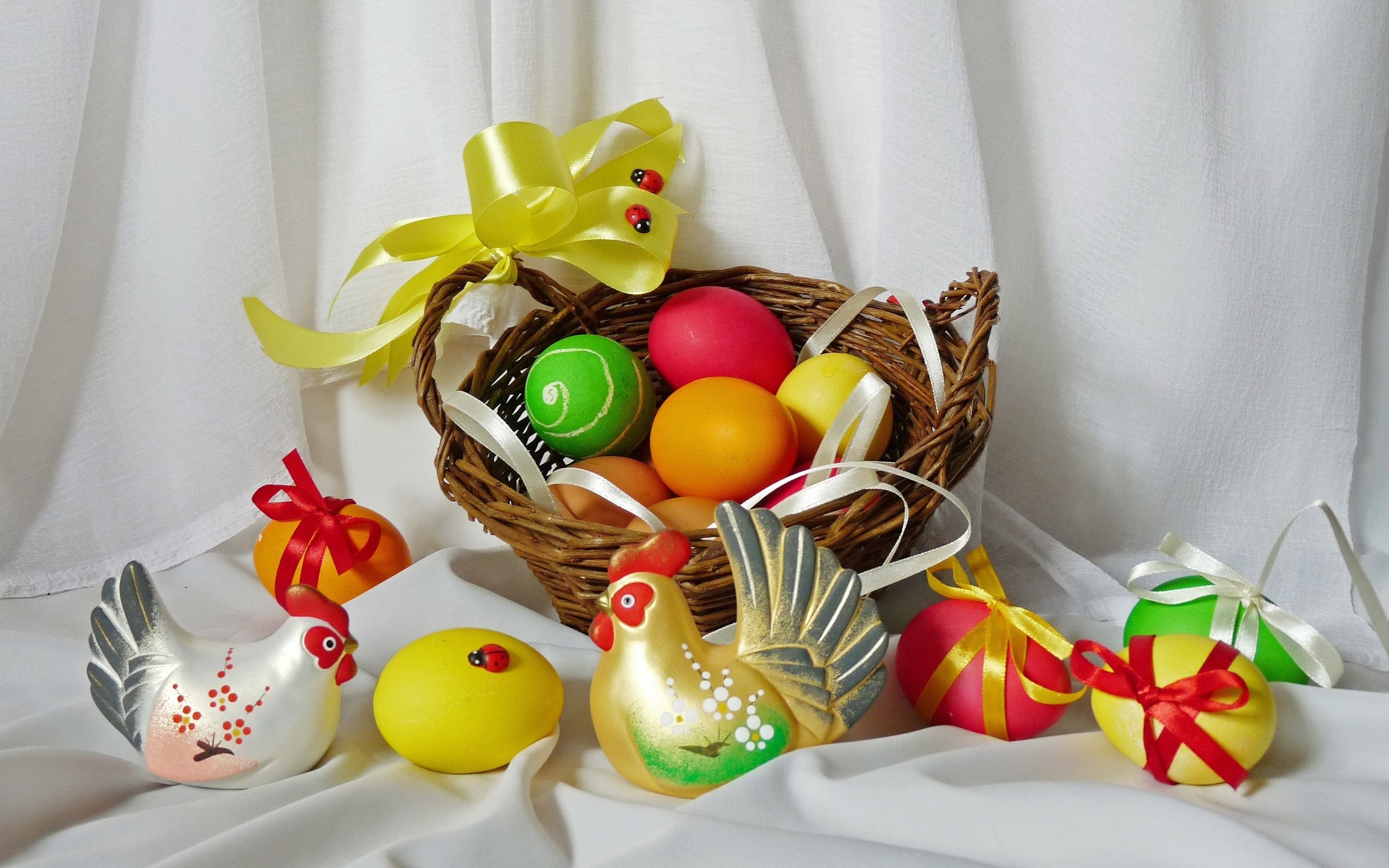 Easter eggs and decorations in a basket HD Wallpaper