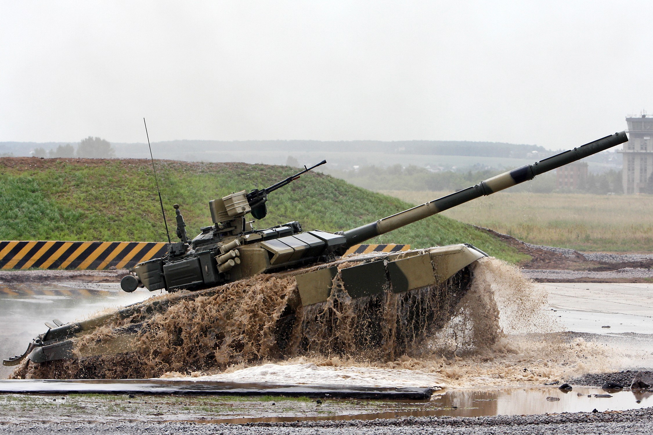 Tank driving through water obstacle HD Wallpaper