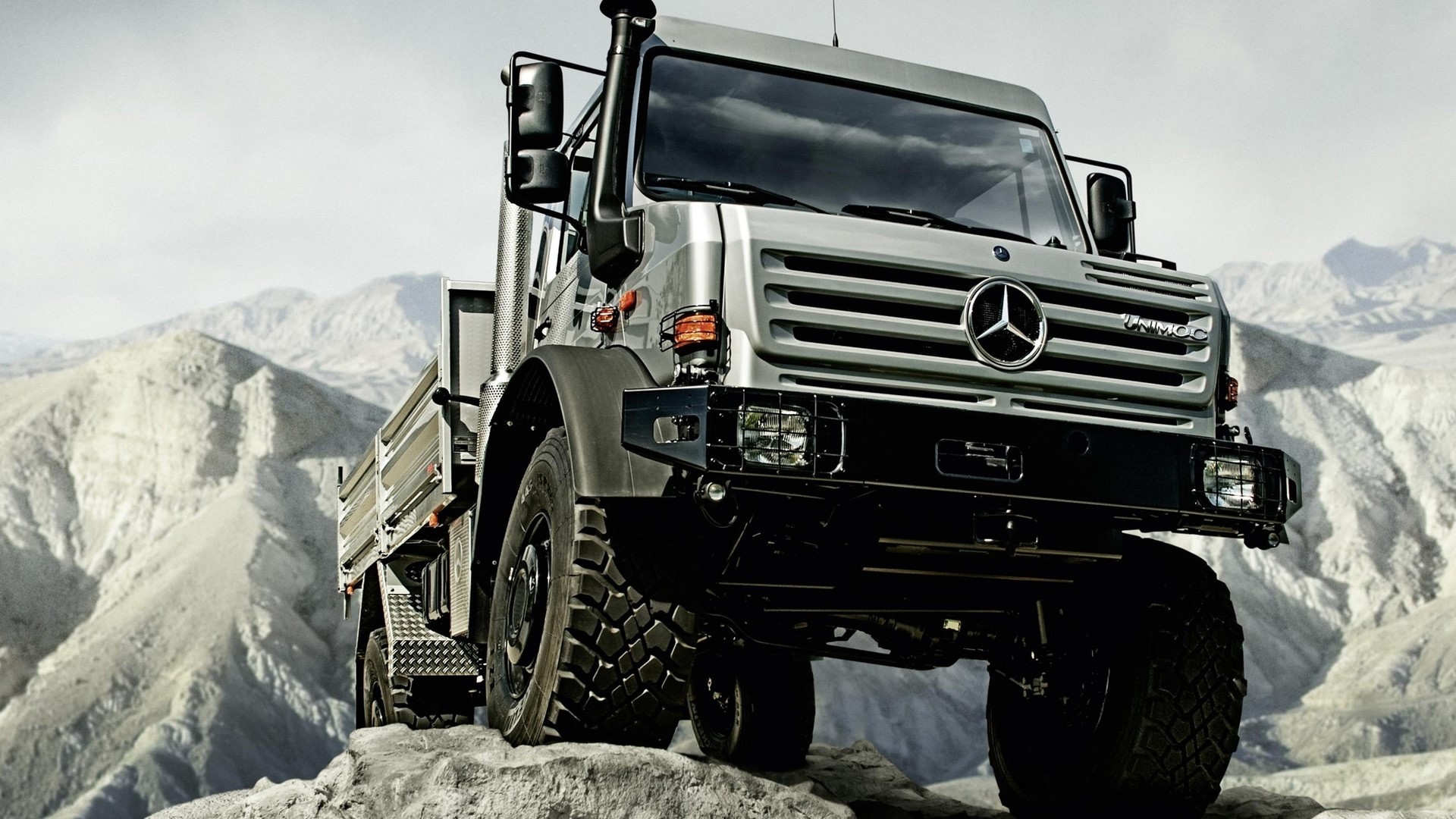 Mercedes-Benz Unimog truck on rocky terrain HD Wallpaper