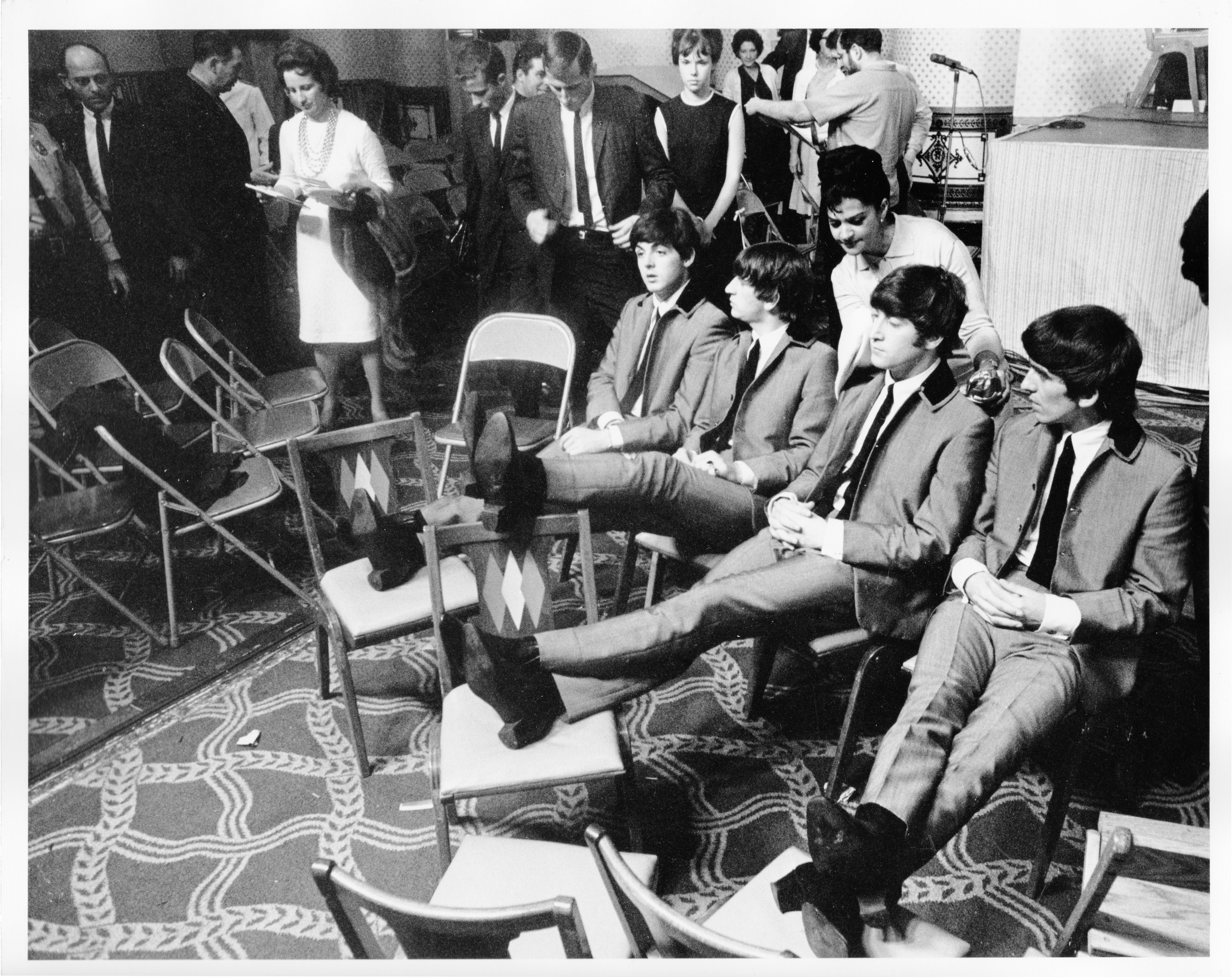 The Beatles sitting in chairs HD Wallpaper