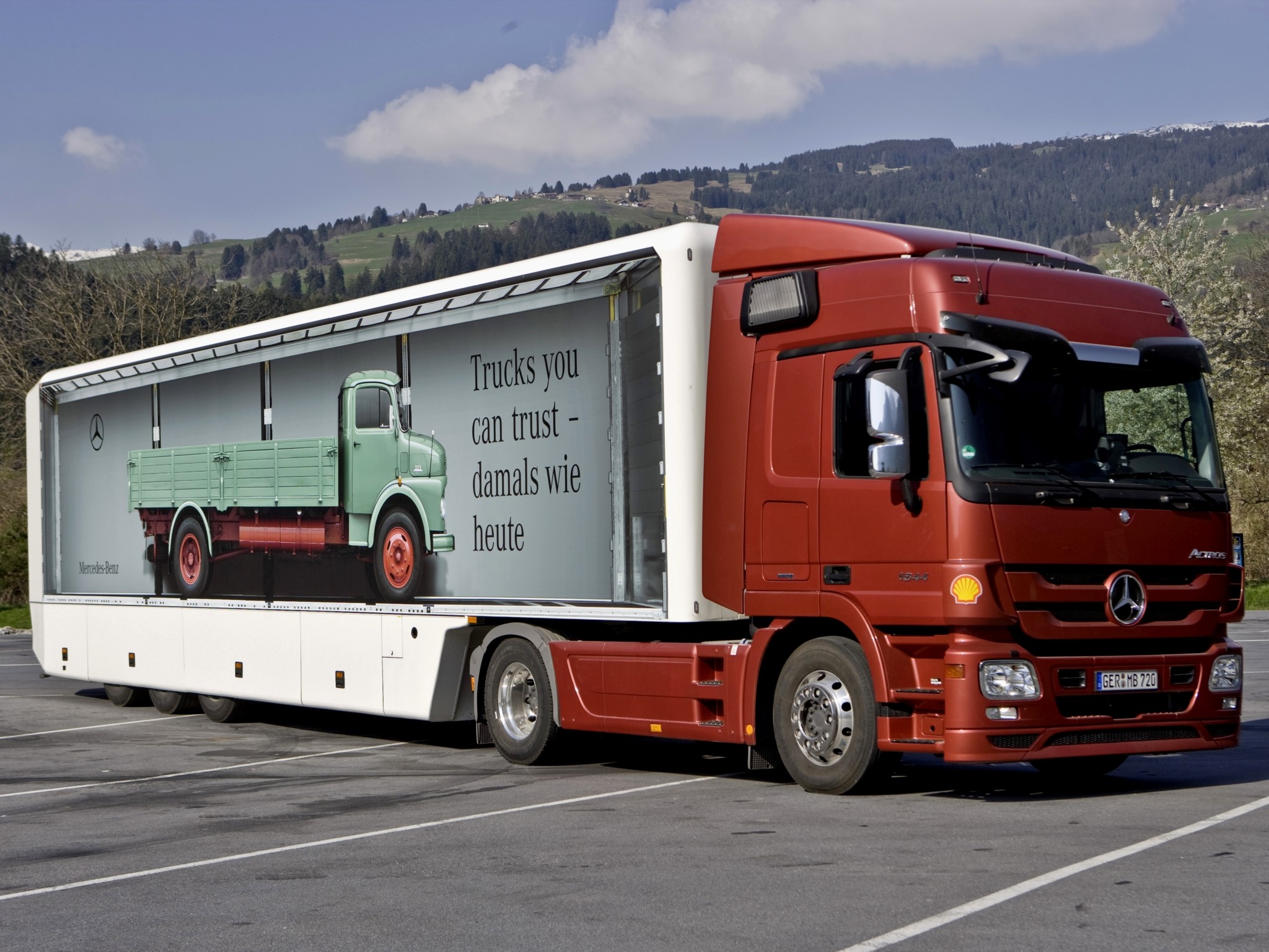 Mercedes-Benz Actros truck with trailer advertisement HD Wallpaper