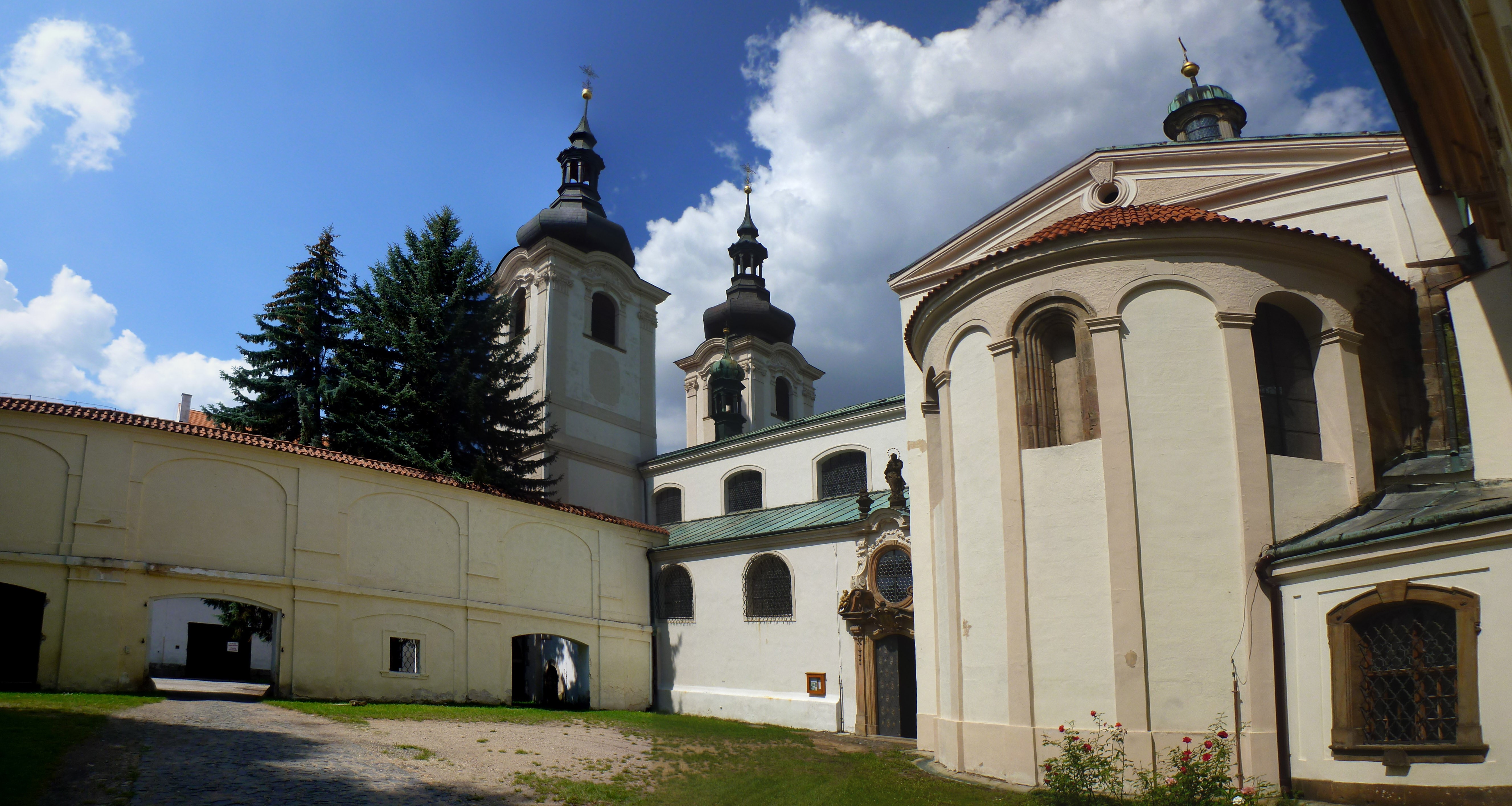 Church with towers and courtyard HD Wallpaper
