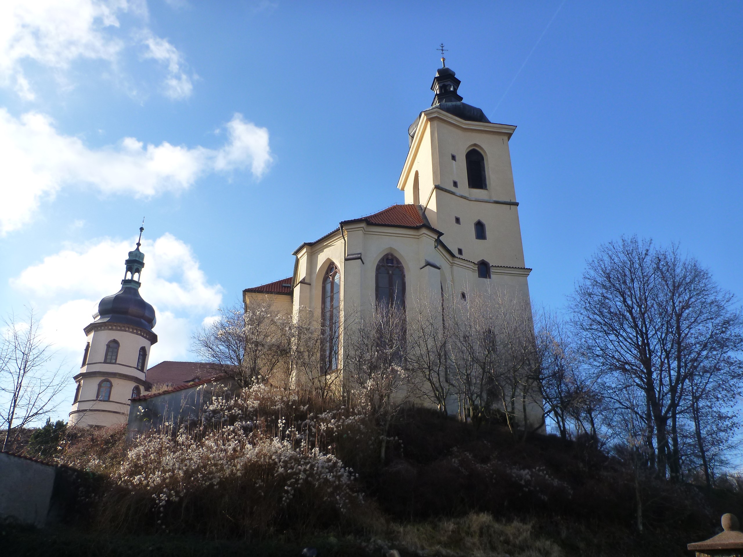 Church with a tower and a round tower on a hill HD Wallpaper