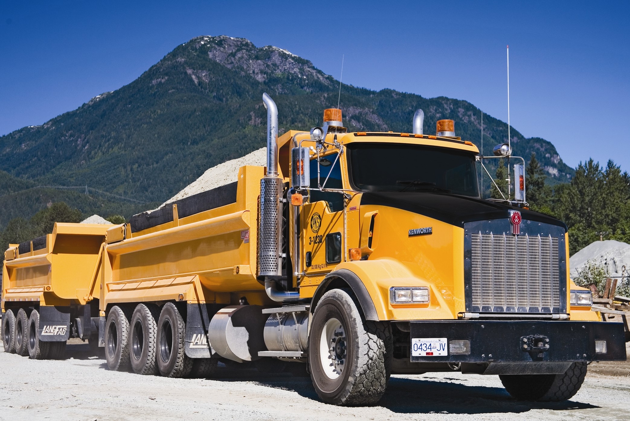 Yellow Kenworth dump truck with trailer HD Wallpaper
