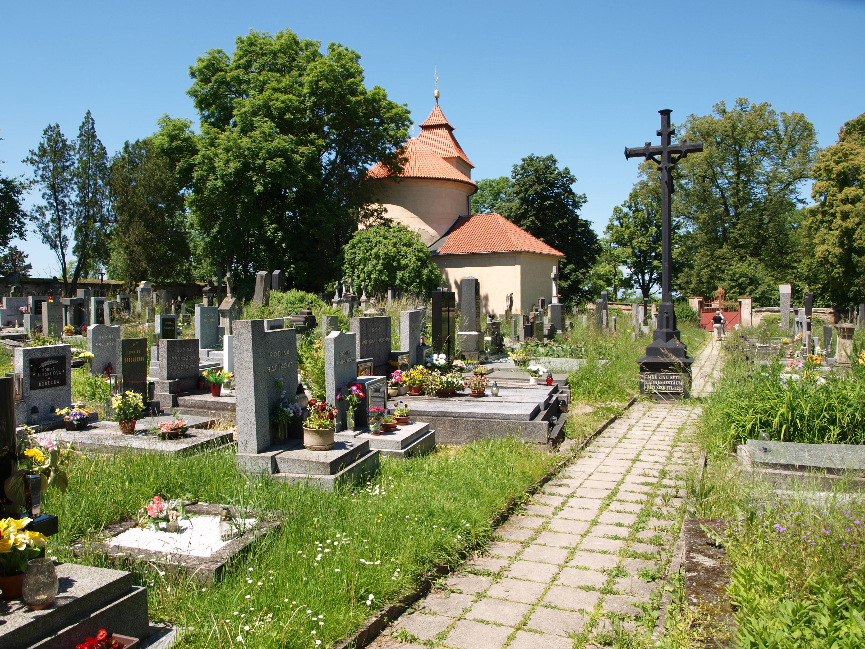 Cemetery with a small church and a large cross HD Wallpaper