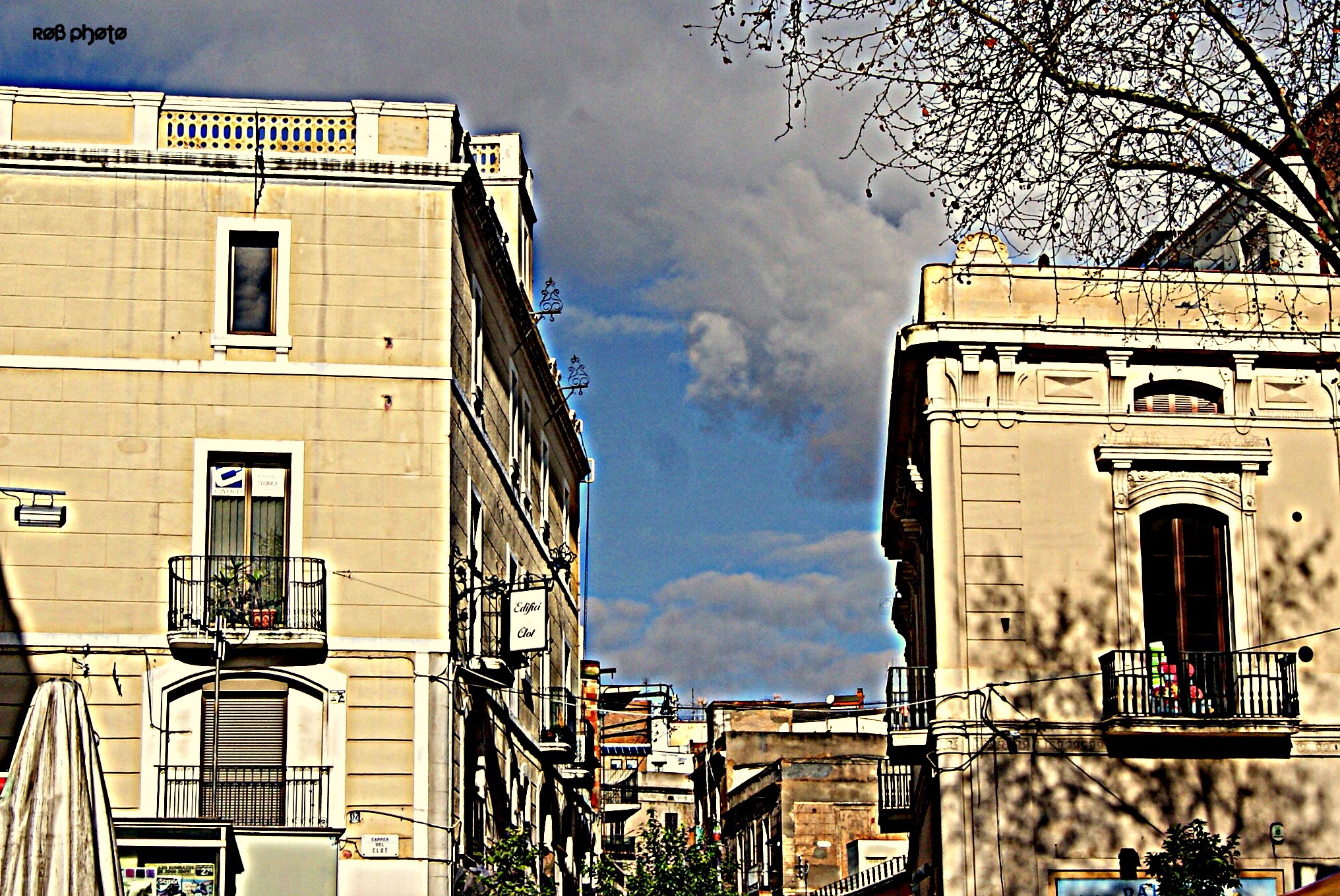 Buildings in Spain with cloudy sky HD Wallpaper