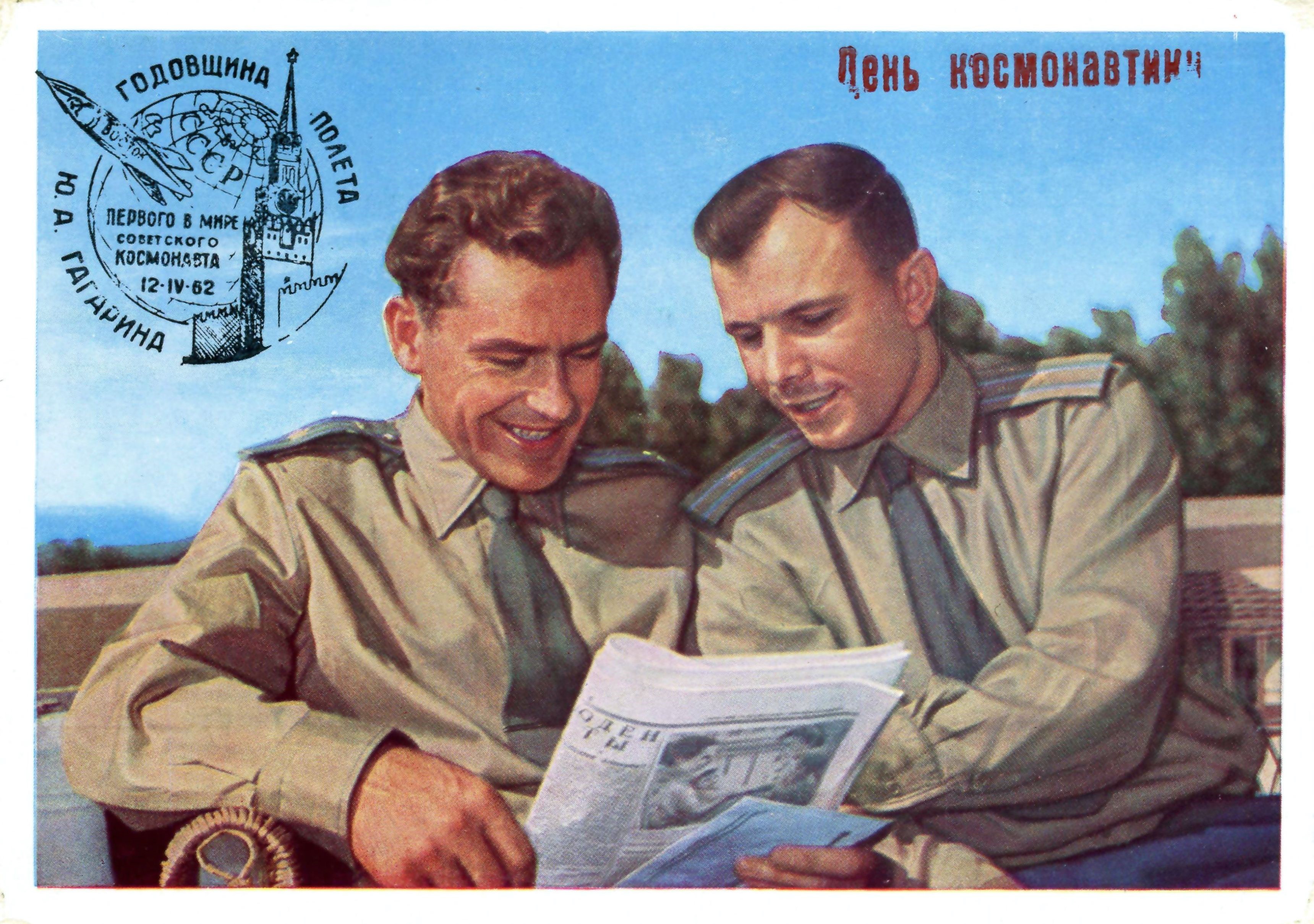 Yuri Gagarin and another cosmonaut reading a newspaper HD Wallpaper