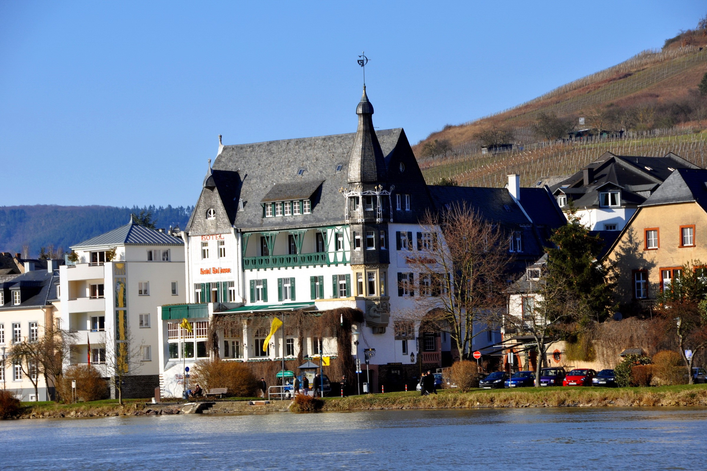Hotel building on a river in Germany HD Wallpaper