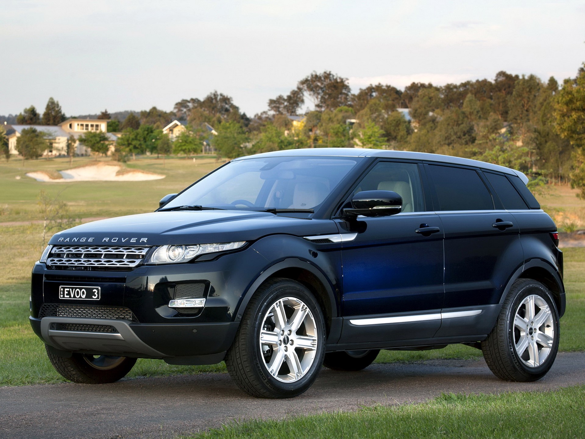 Black Range Rover Evoque on a road HD Wallpaper