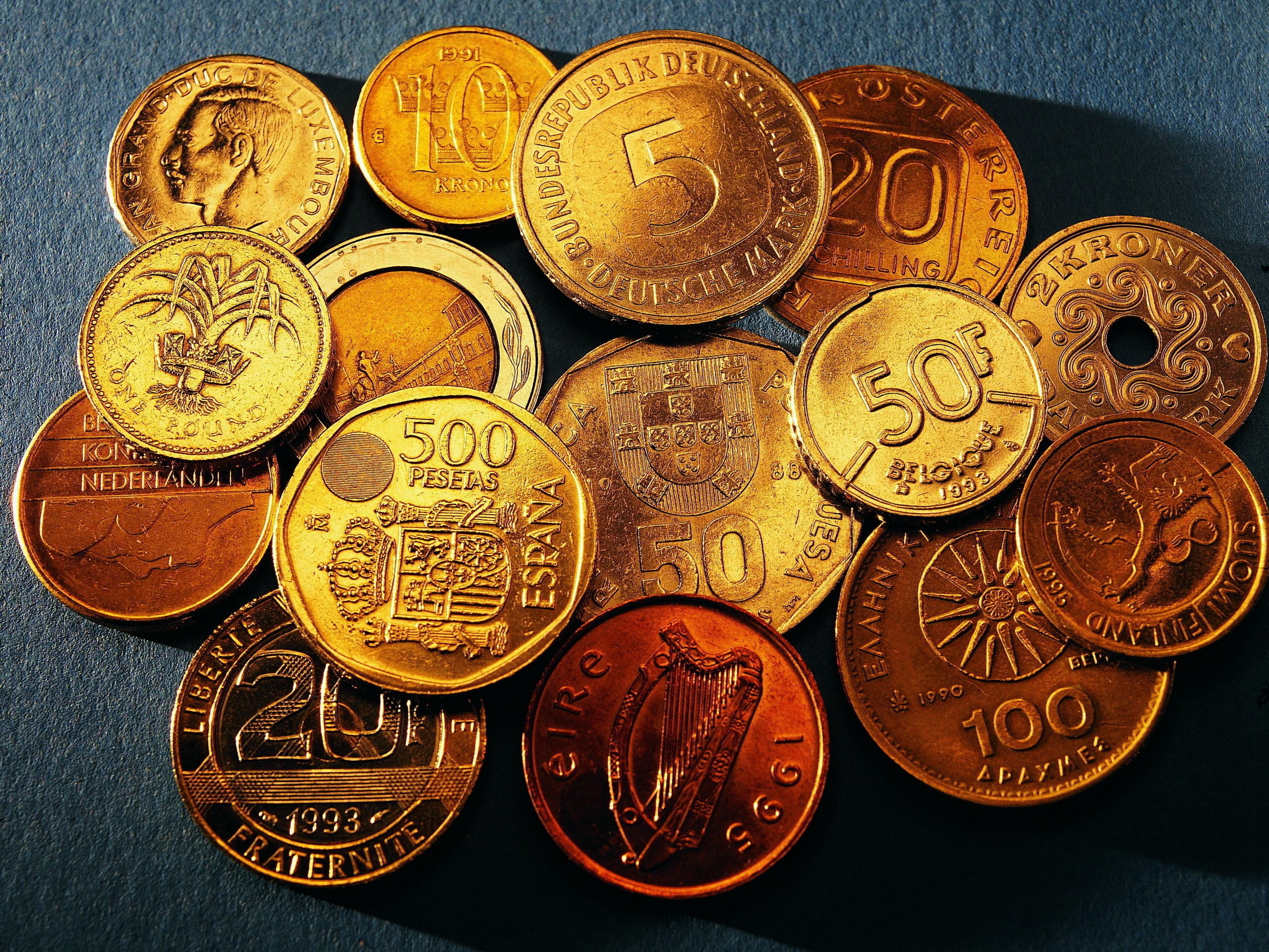 Collection of various international coins HD Wallpaper