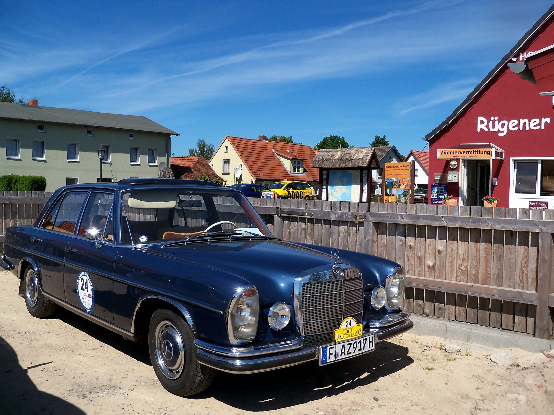 Blue Mercedes-Benz W108 in a German Village HD Wallpaper