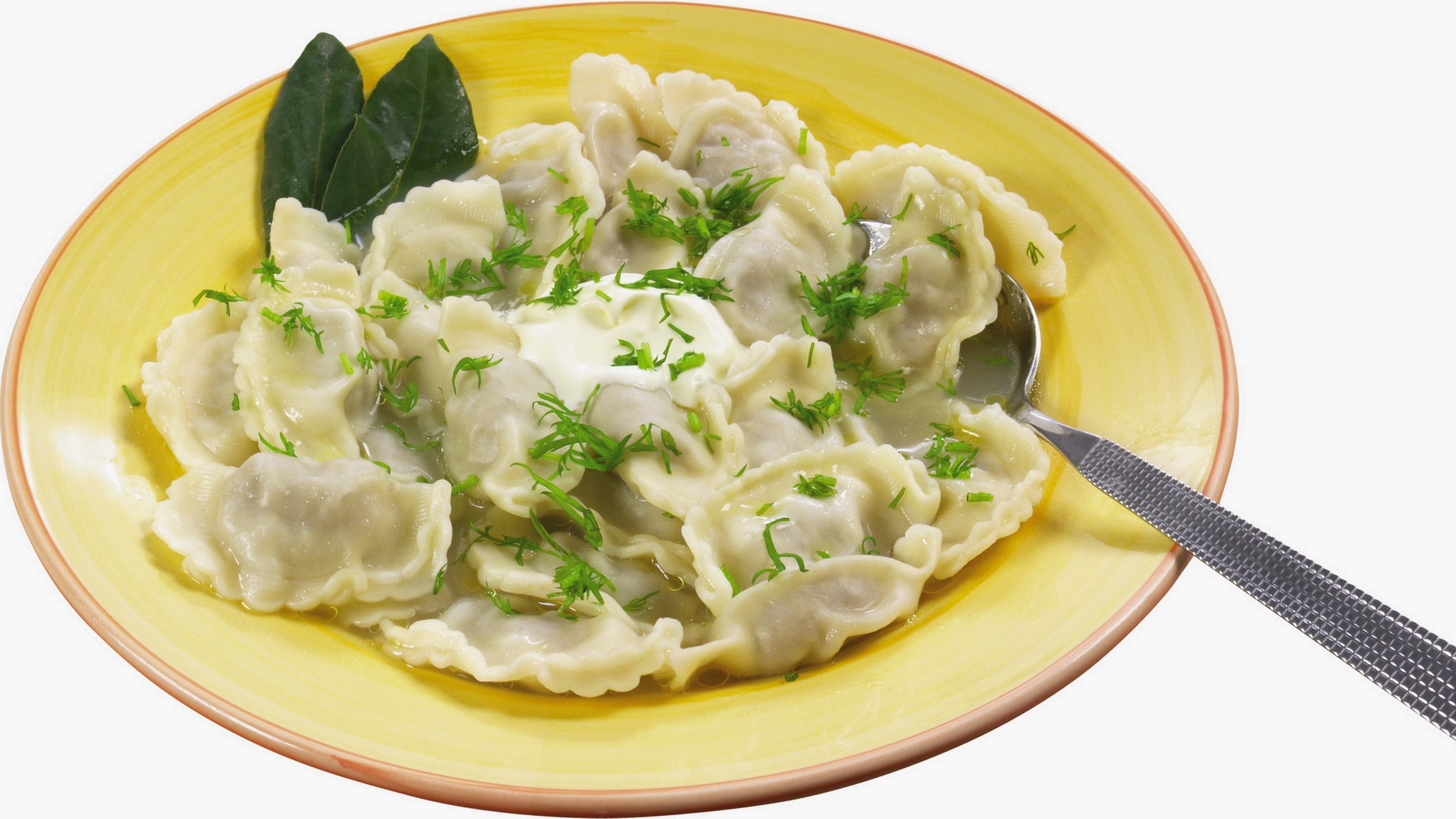 Plate of dumplings with sour cream and dill HD Wallpaper