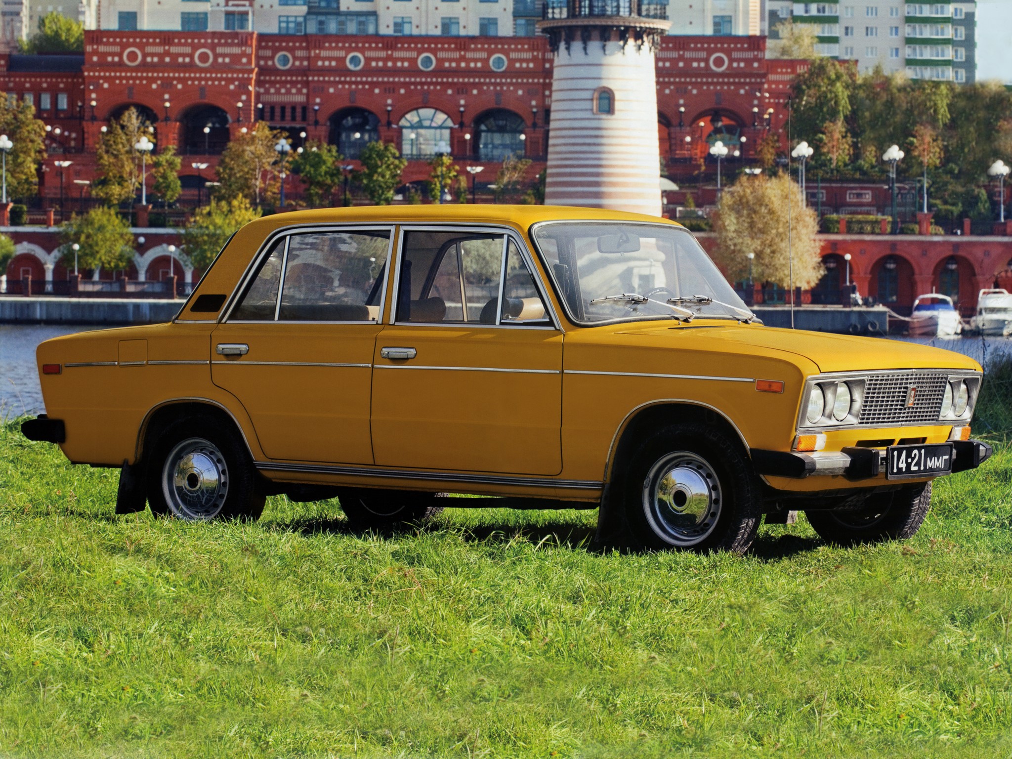 Yellow VAZ-2106 car parked on grass HD Wallpaper