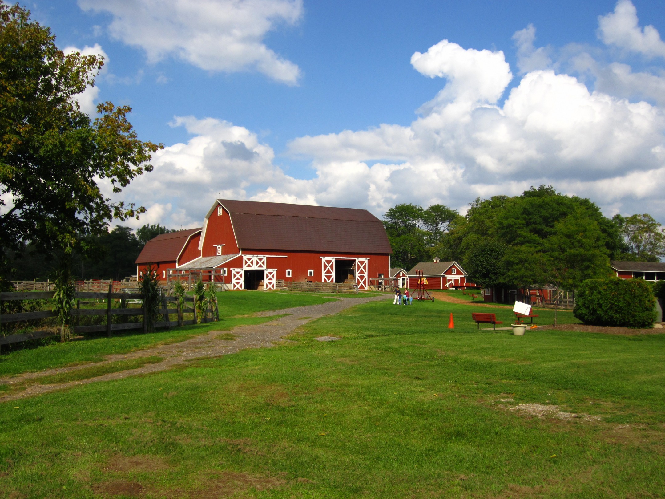 Red barn and farm buildings in Michigan HD Wallpaper