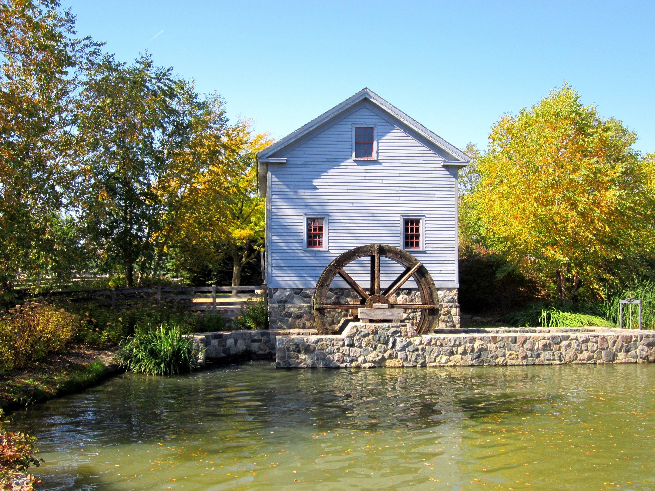 Old water mill by a pond in autumn HD Wallpaper