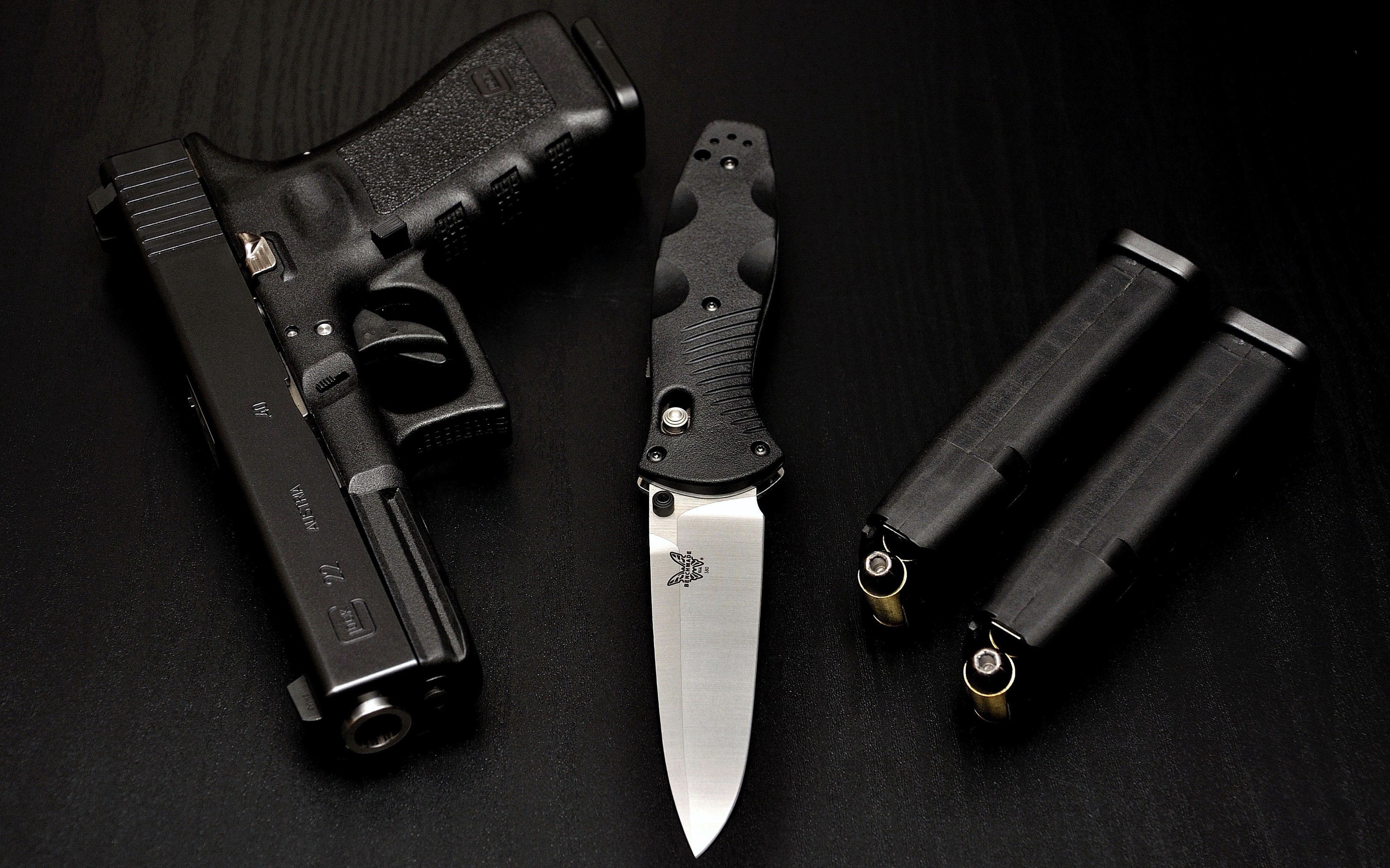 Glock pistol, folding knife, and magazines HD Wallpaper