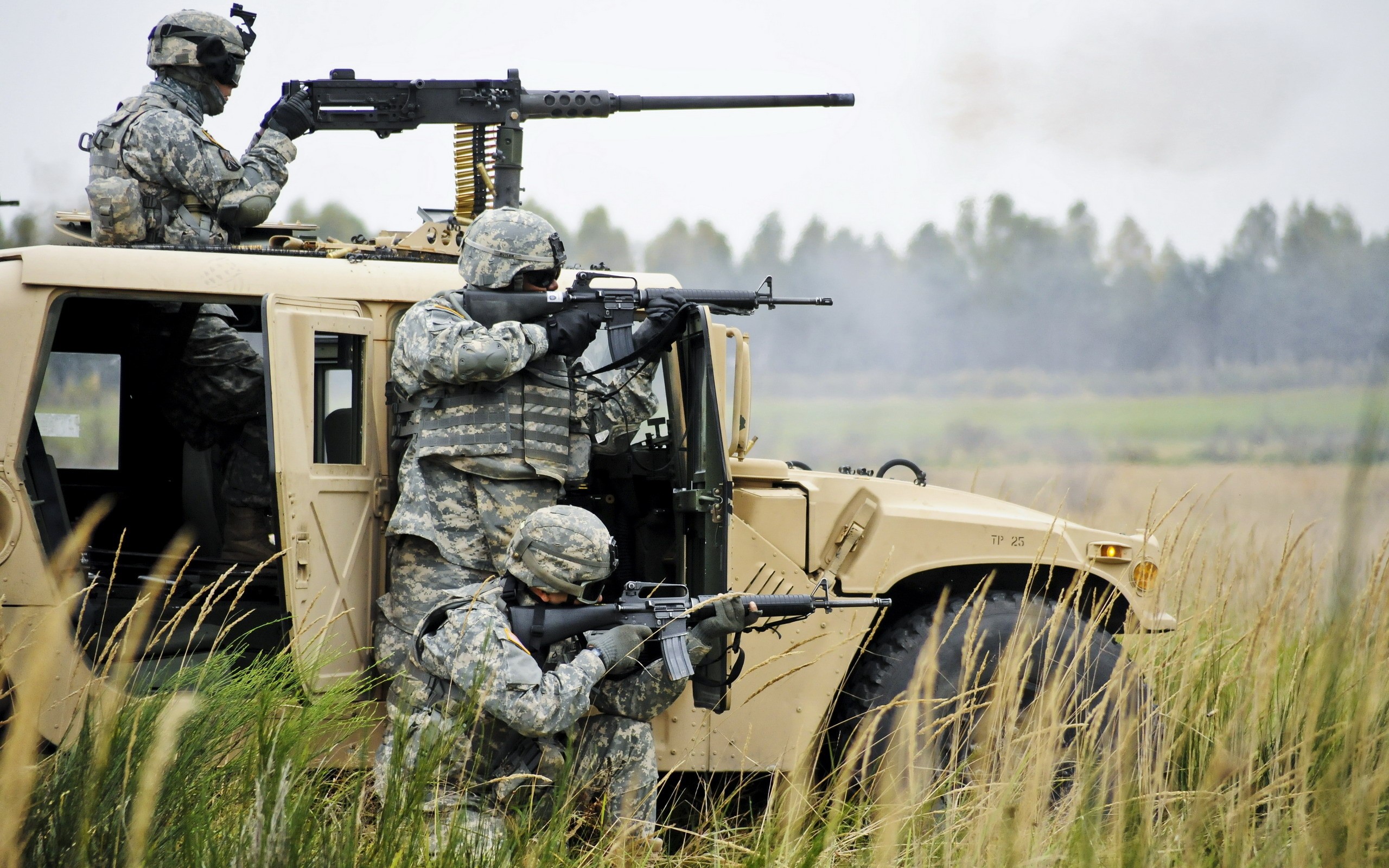 Soldiers in a Humvee with machine gun HD Wallpaper