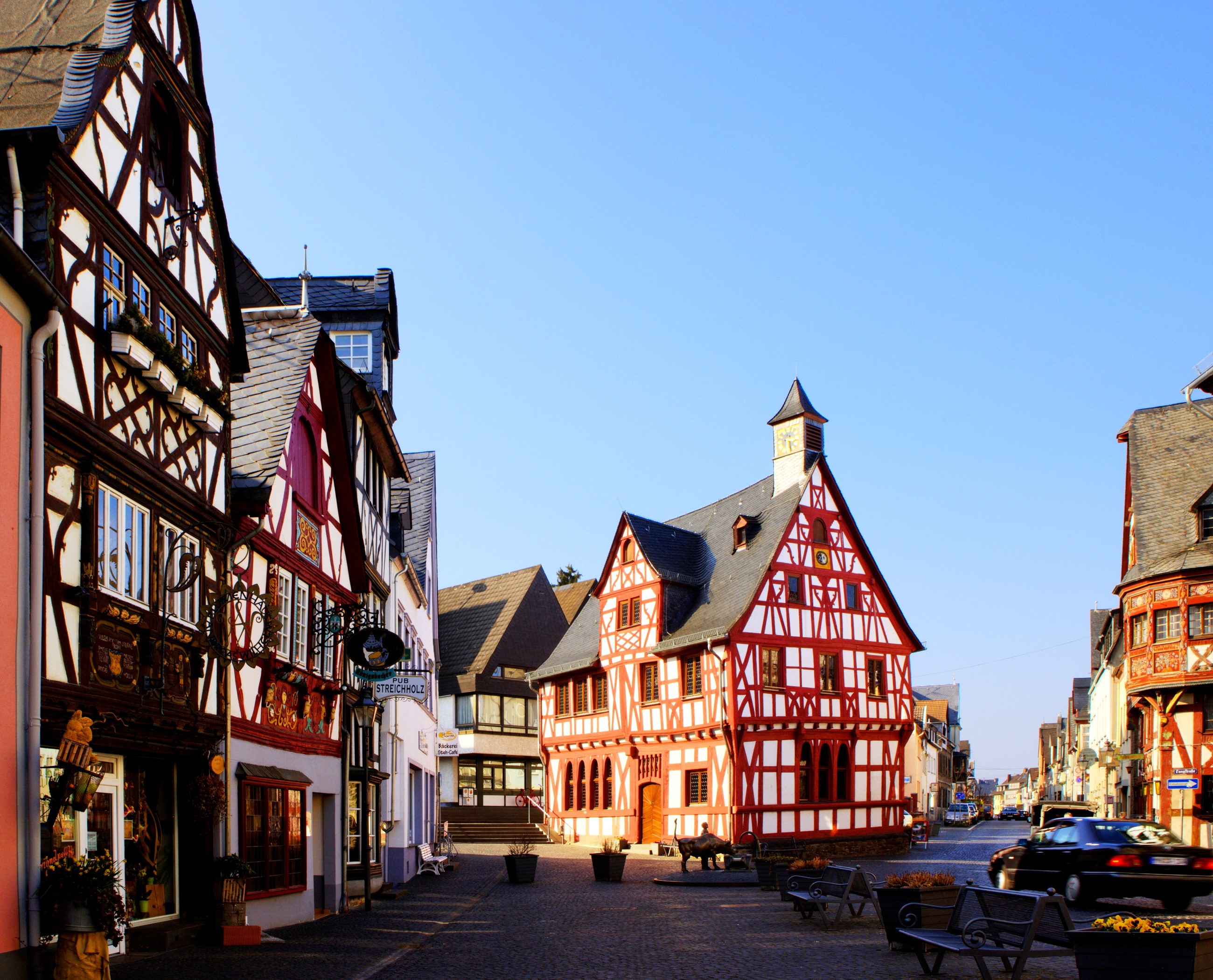 Half-timbered houses in a German town square HD Wallpaper