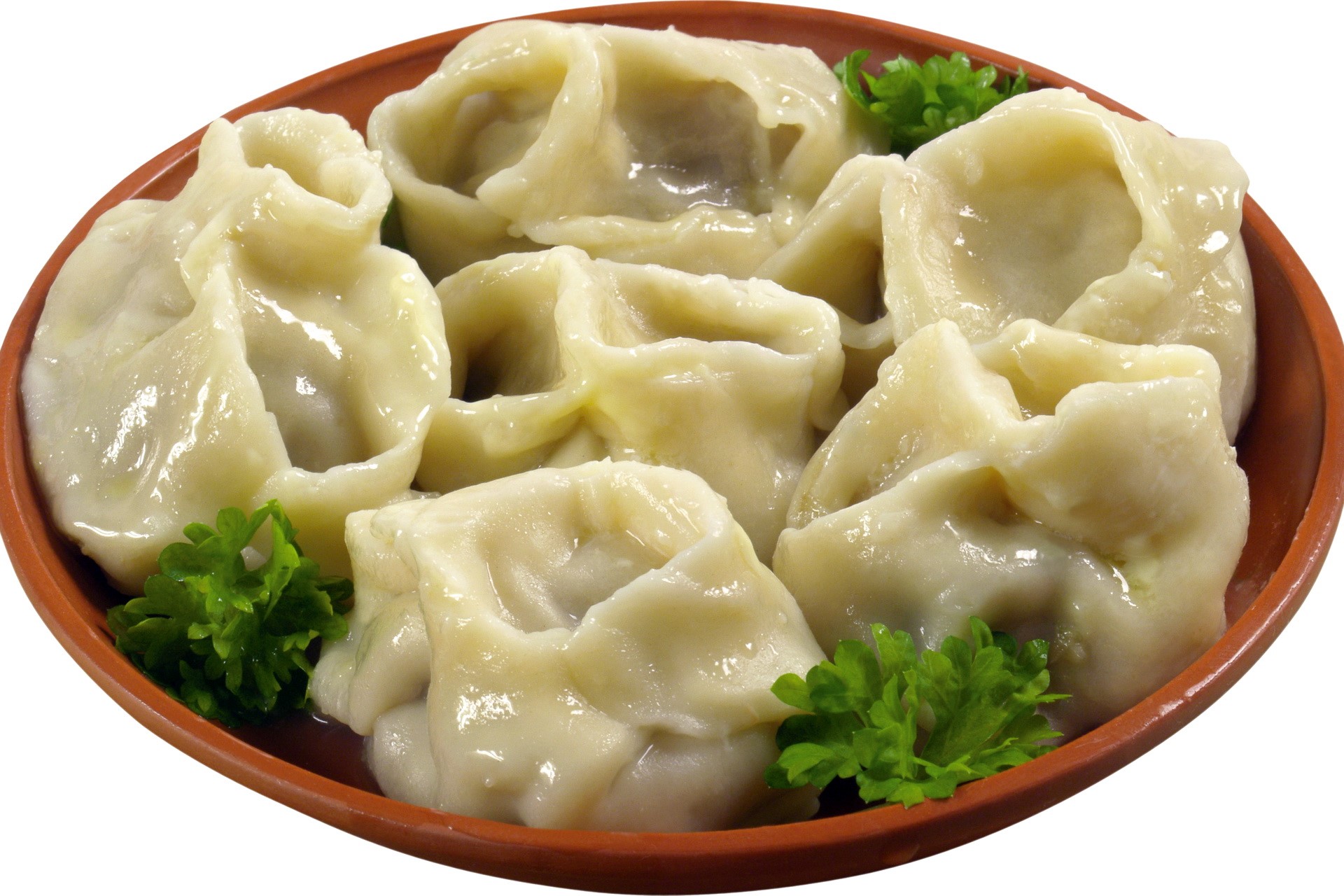 Steamed dumplings on a plate with parsley HD Wallpaper