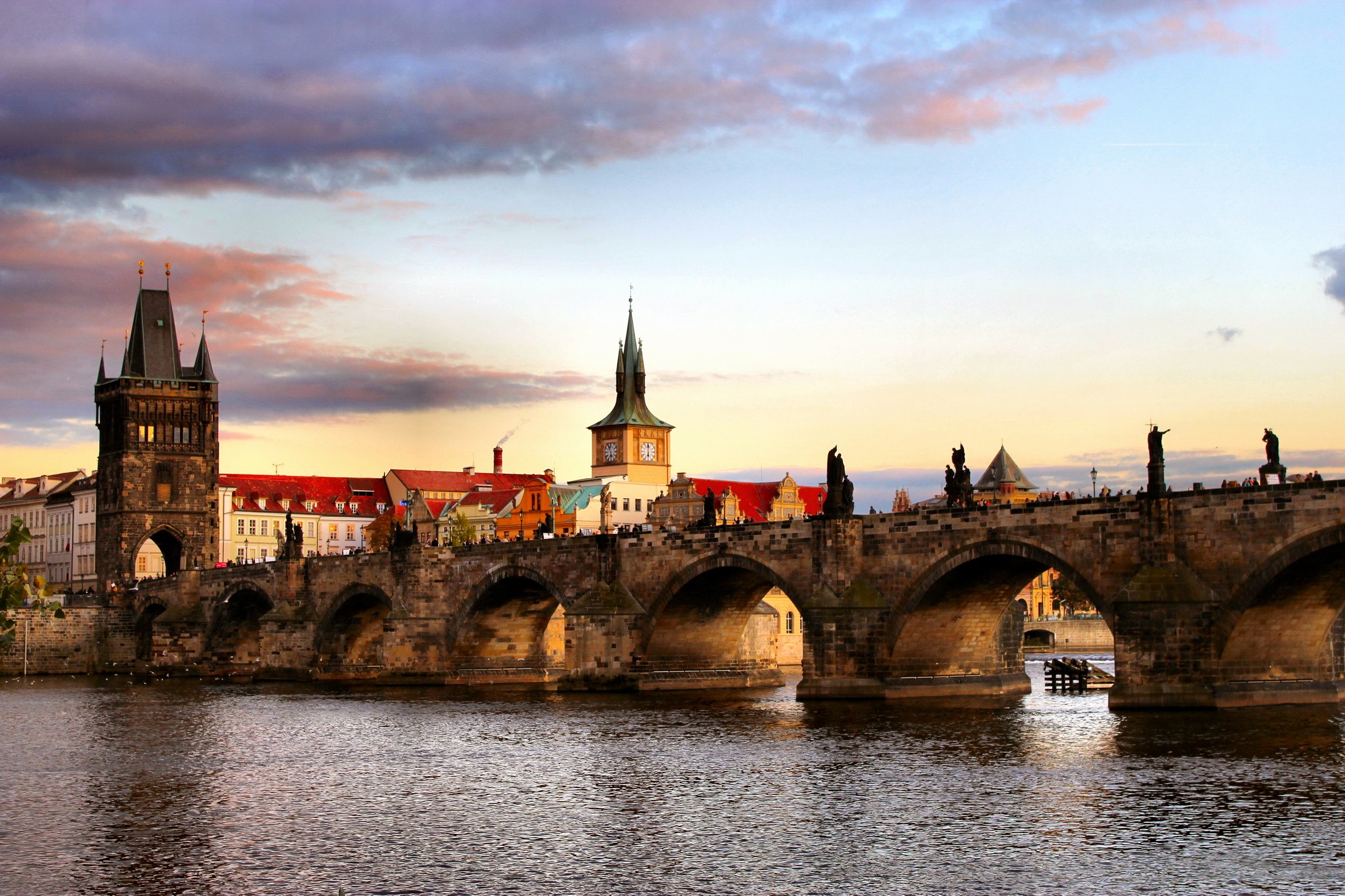 Charles Bridge in Prague, Czech Republic at sunset HD Wallpaper