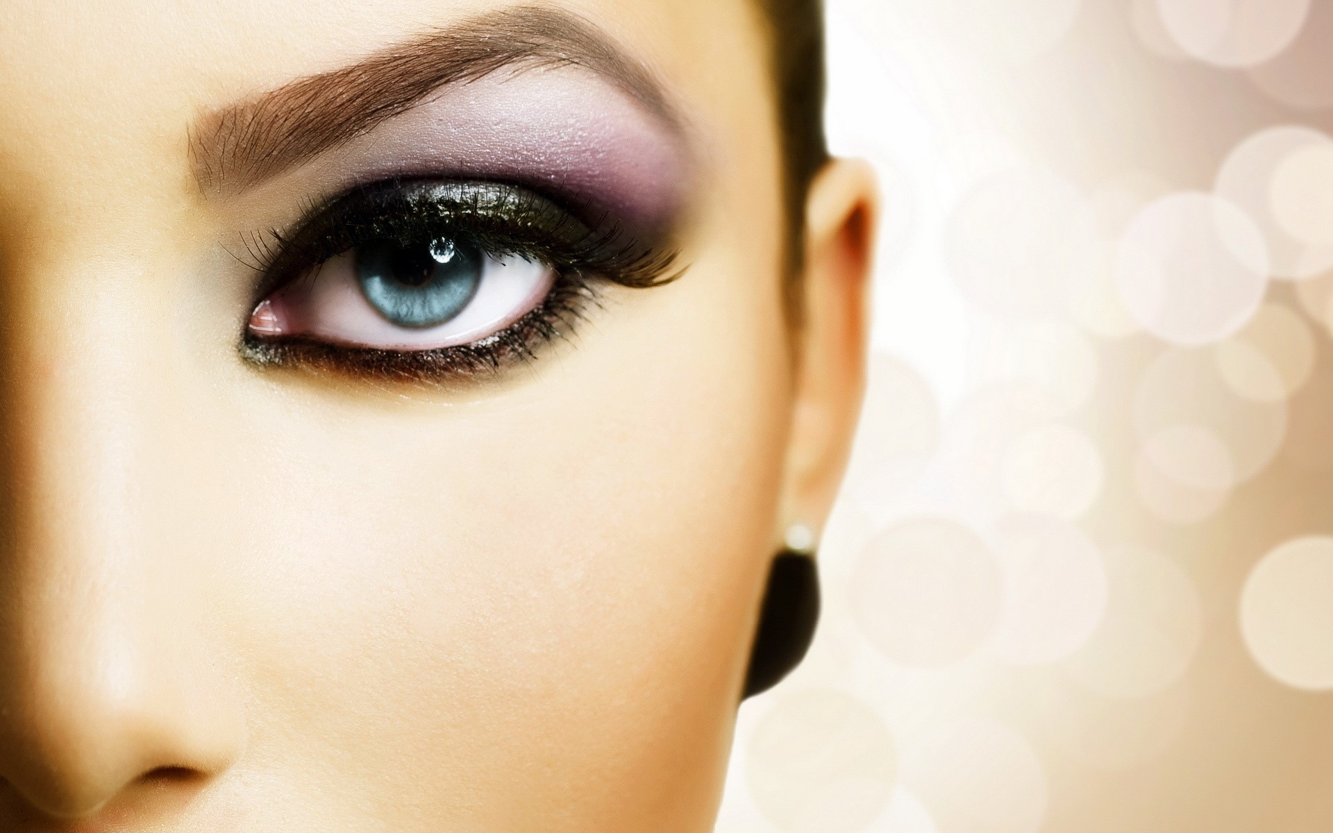 Close-up of a woman's eye and nose with makeup HD Wallpaper