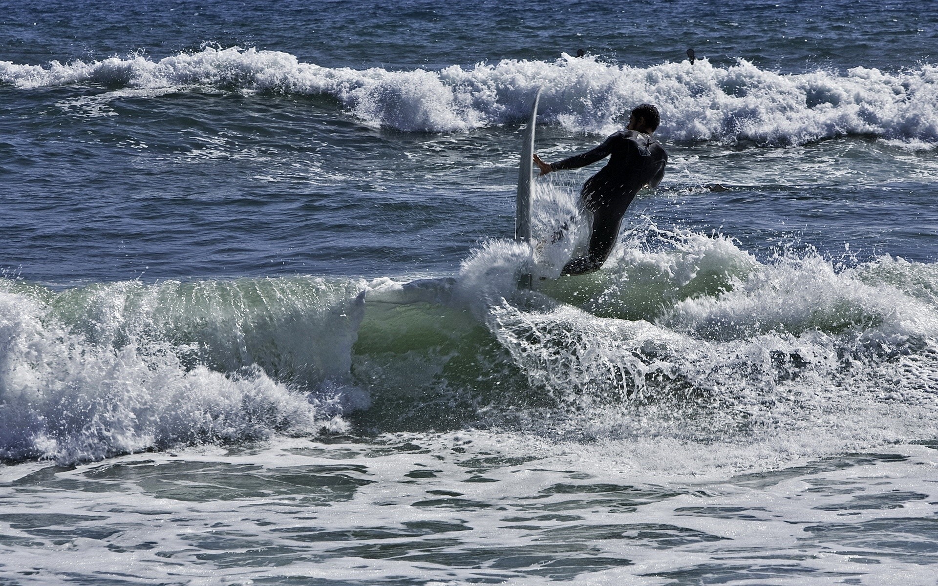 Surfer in black wetsuit riding a wave HD Wallpaper