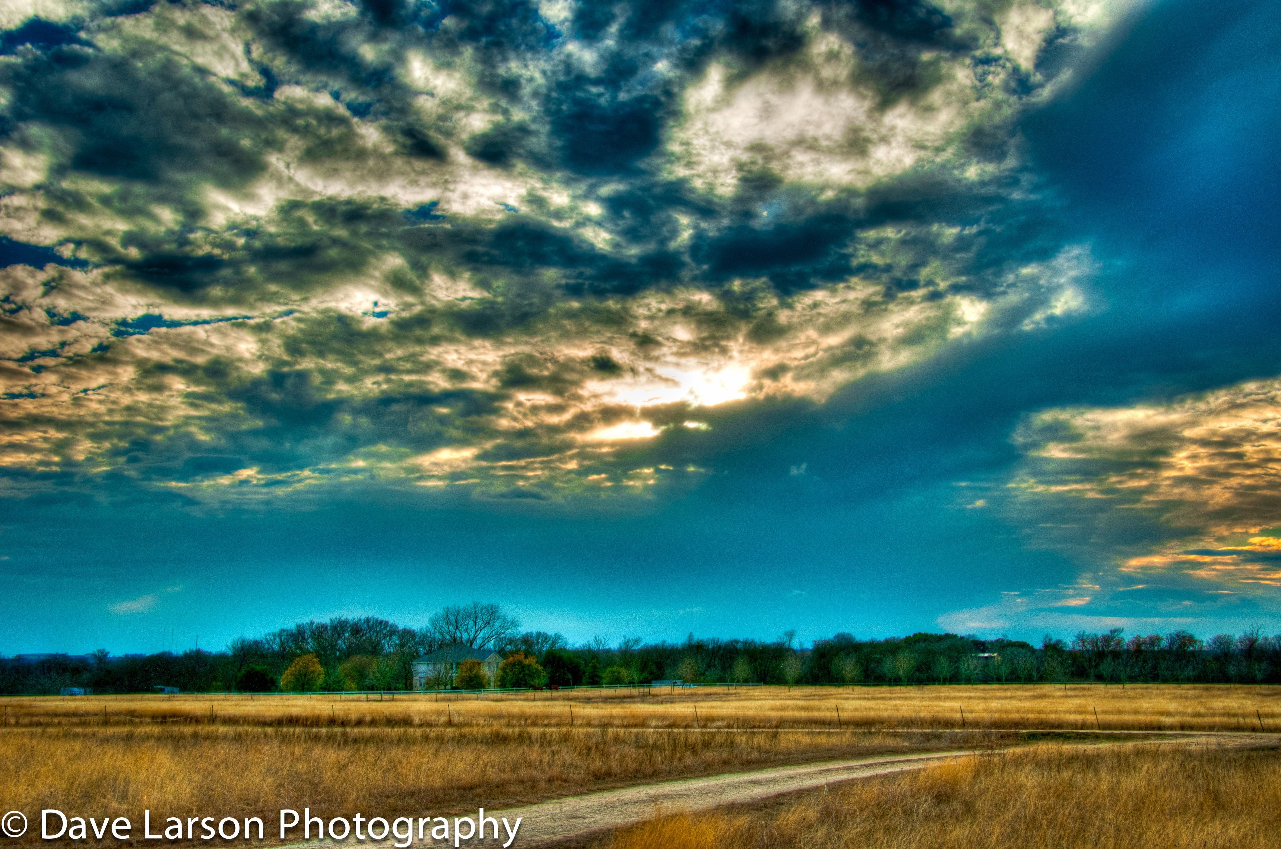 4K Field with Dramatic Clouds and House HD Wallpaper