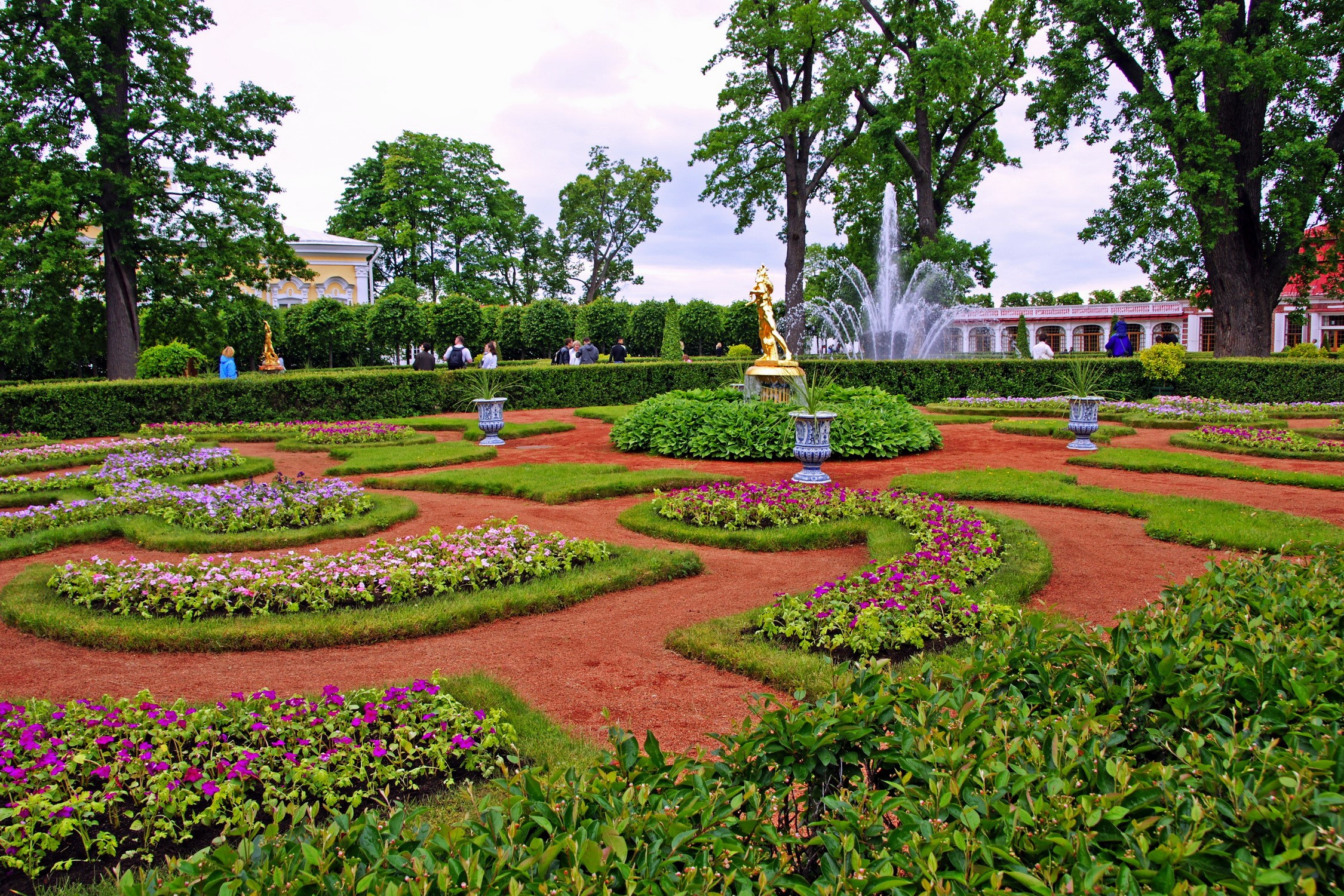 Formal garden with fountain and sculpture HD Wallpaper