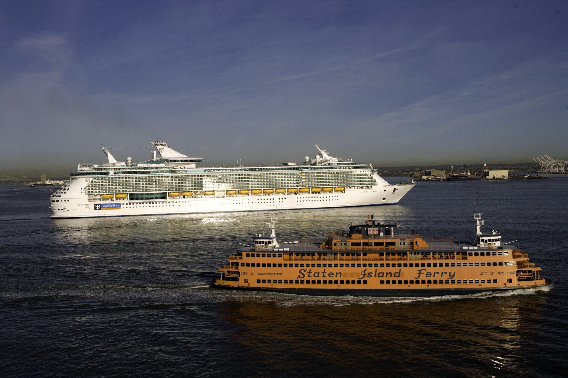 Cruise liner and Staten Island Ferry on the water HD Wallpaper