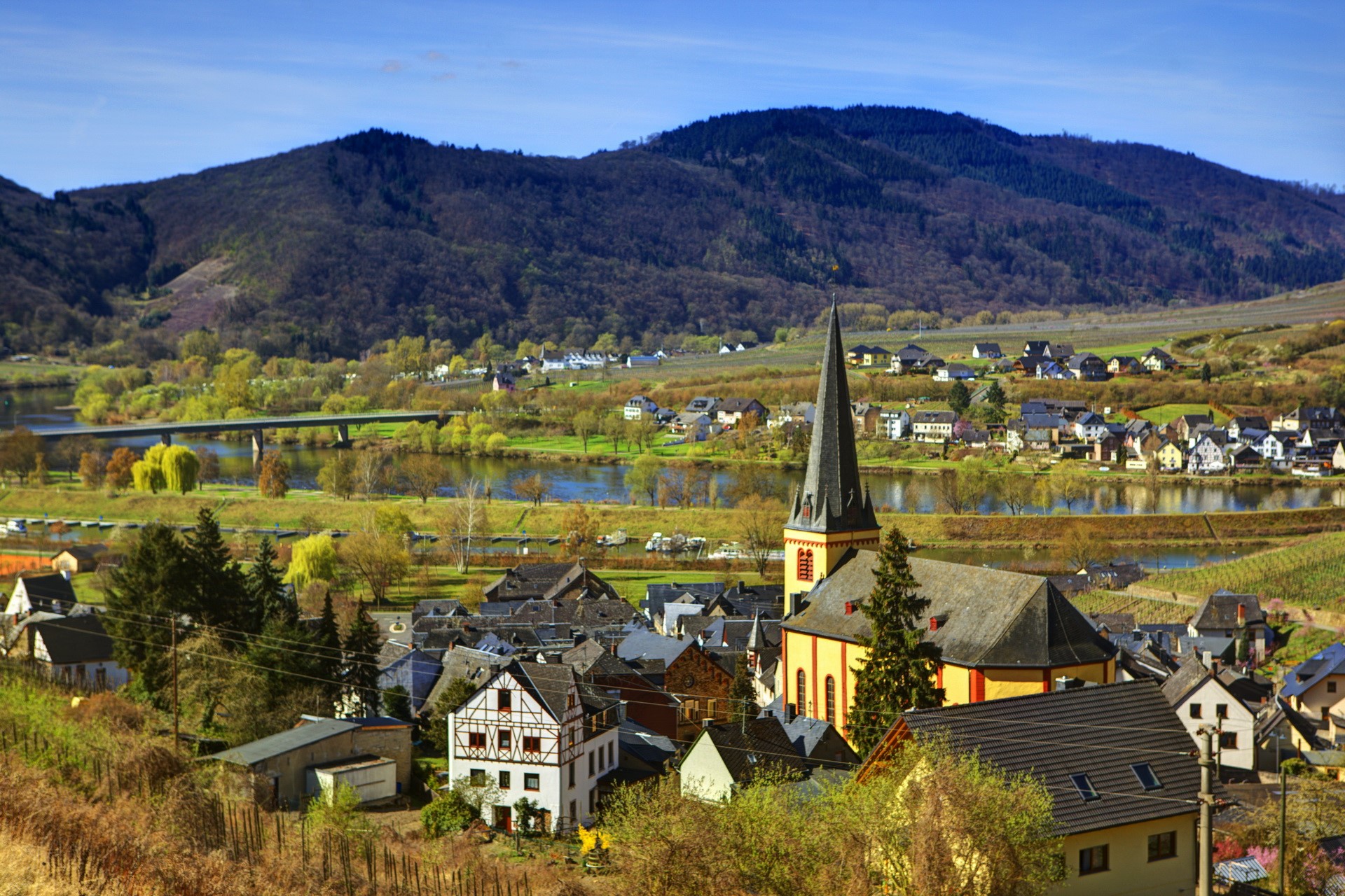 Village with church and river in Germany HD Wallpaper