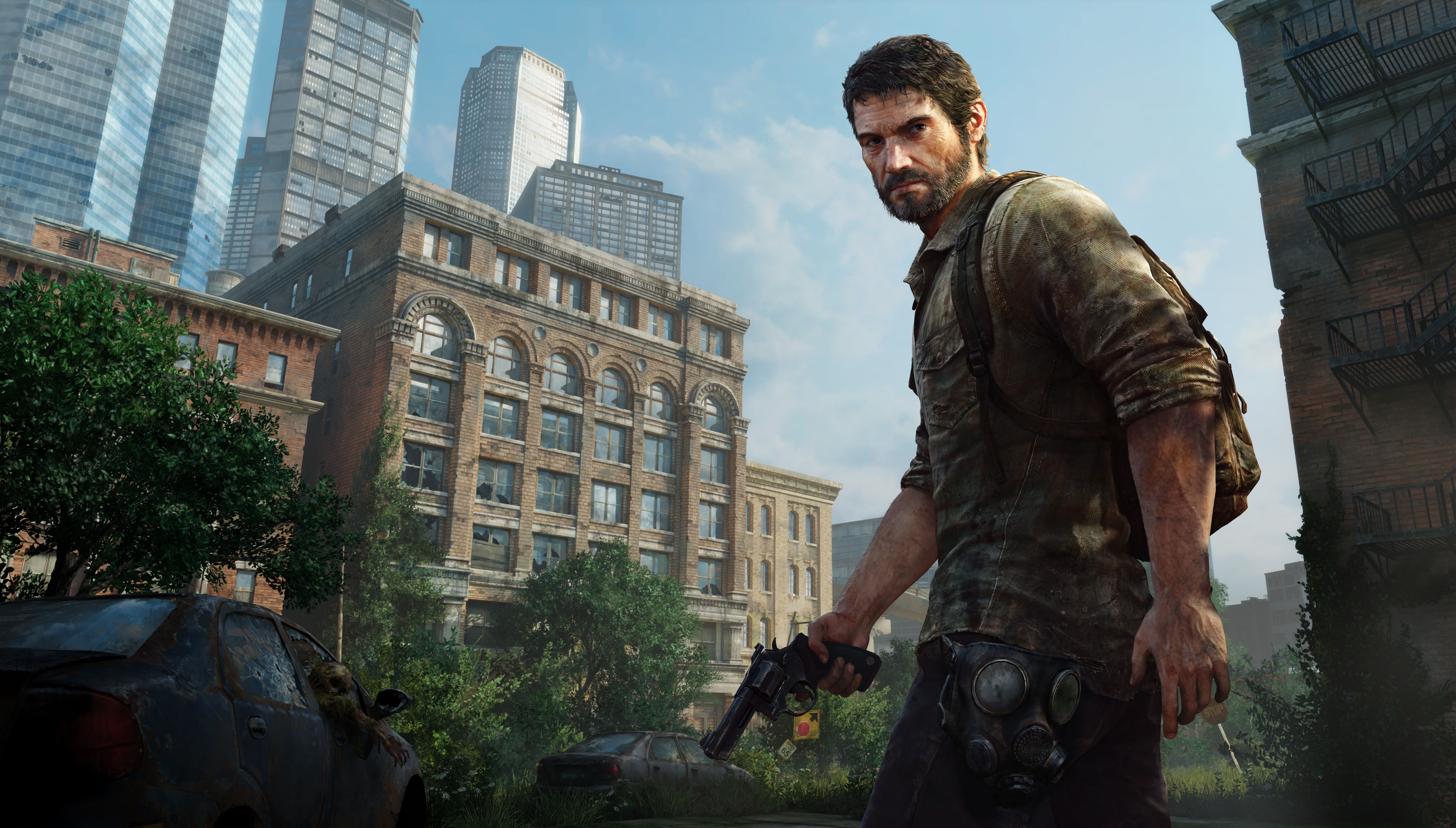 Joel from The Last of Us holding a gun HD Wallpaper