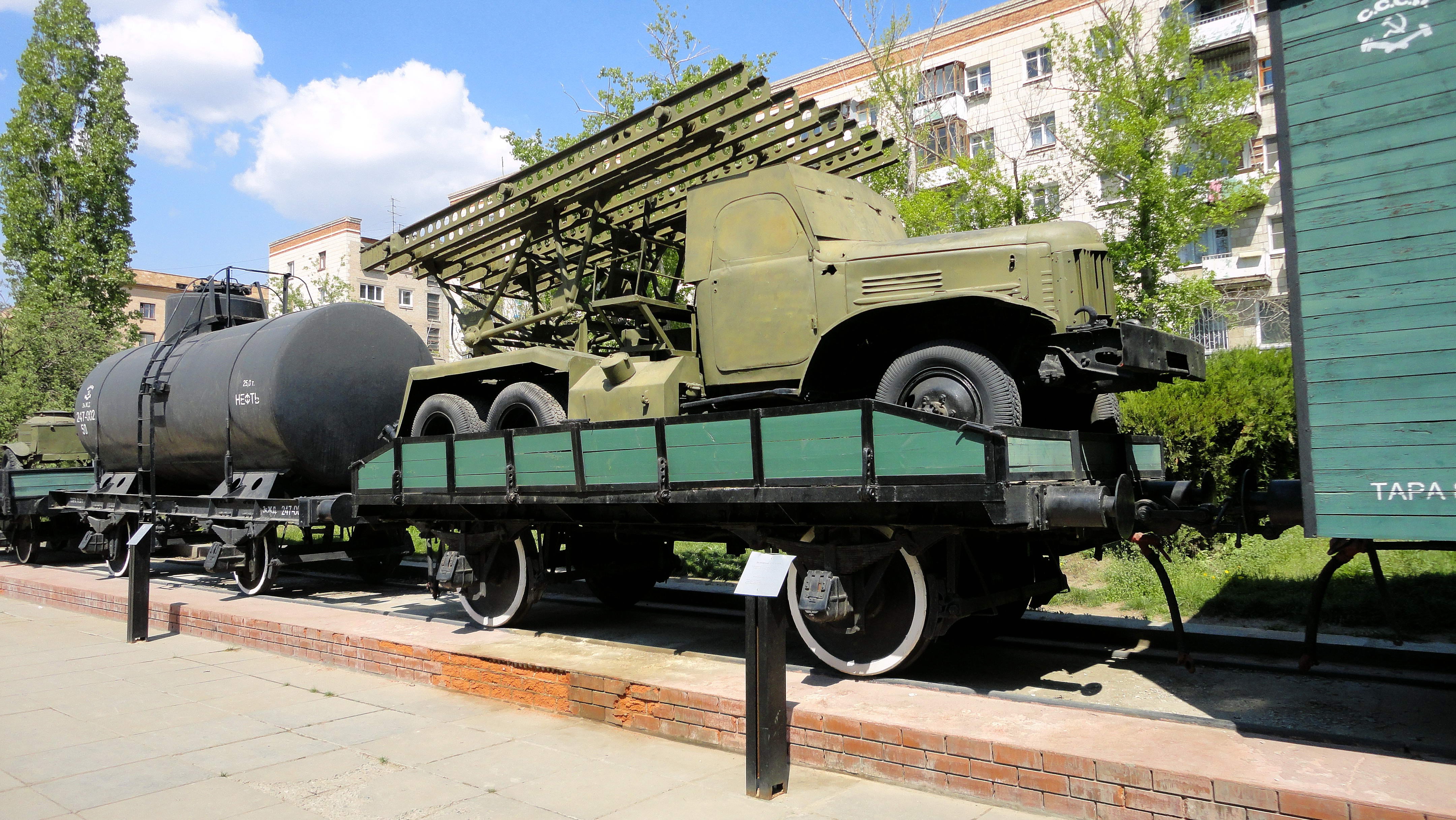Monument of a rocket launcher on a train car HD Wallpaper