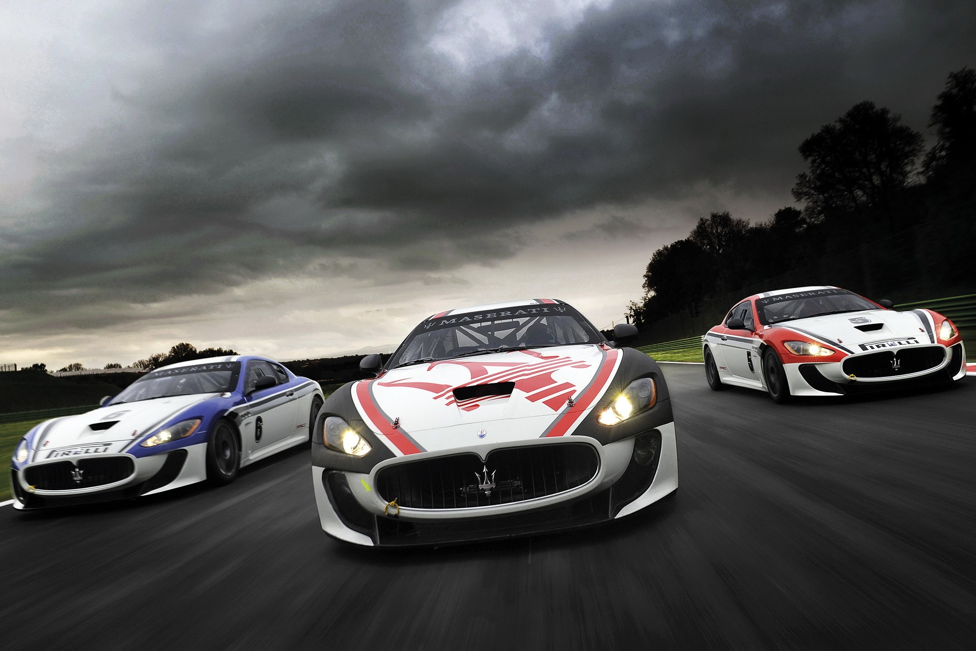 Maserati race cars on a track HD Wallpaper